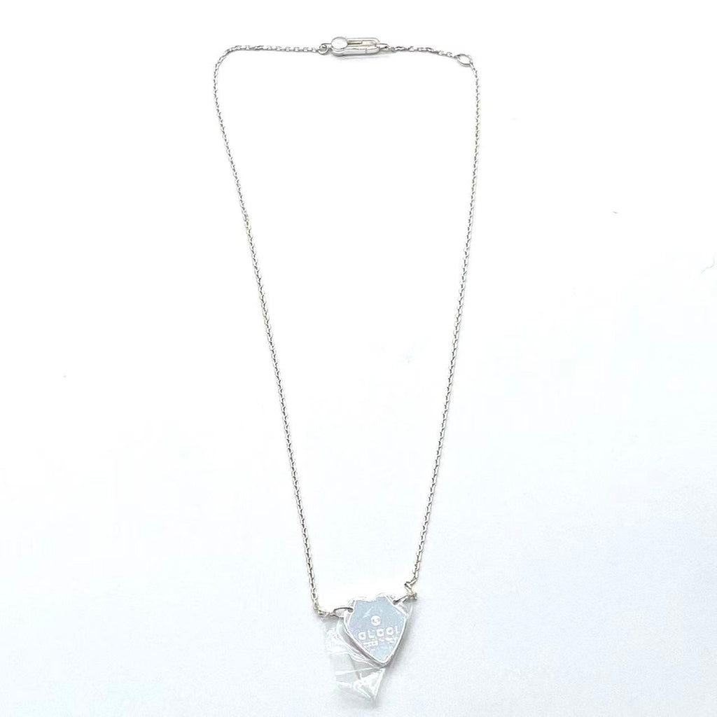 Trademark necklace with heart pendant
