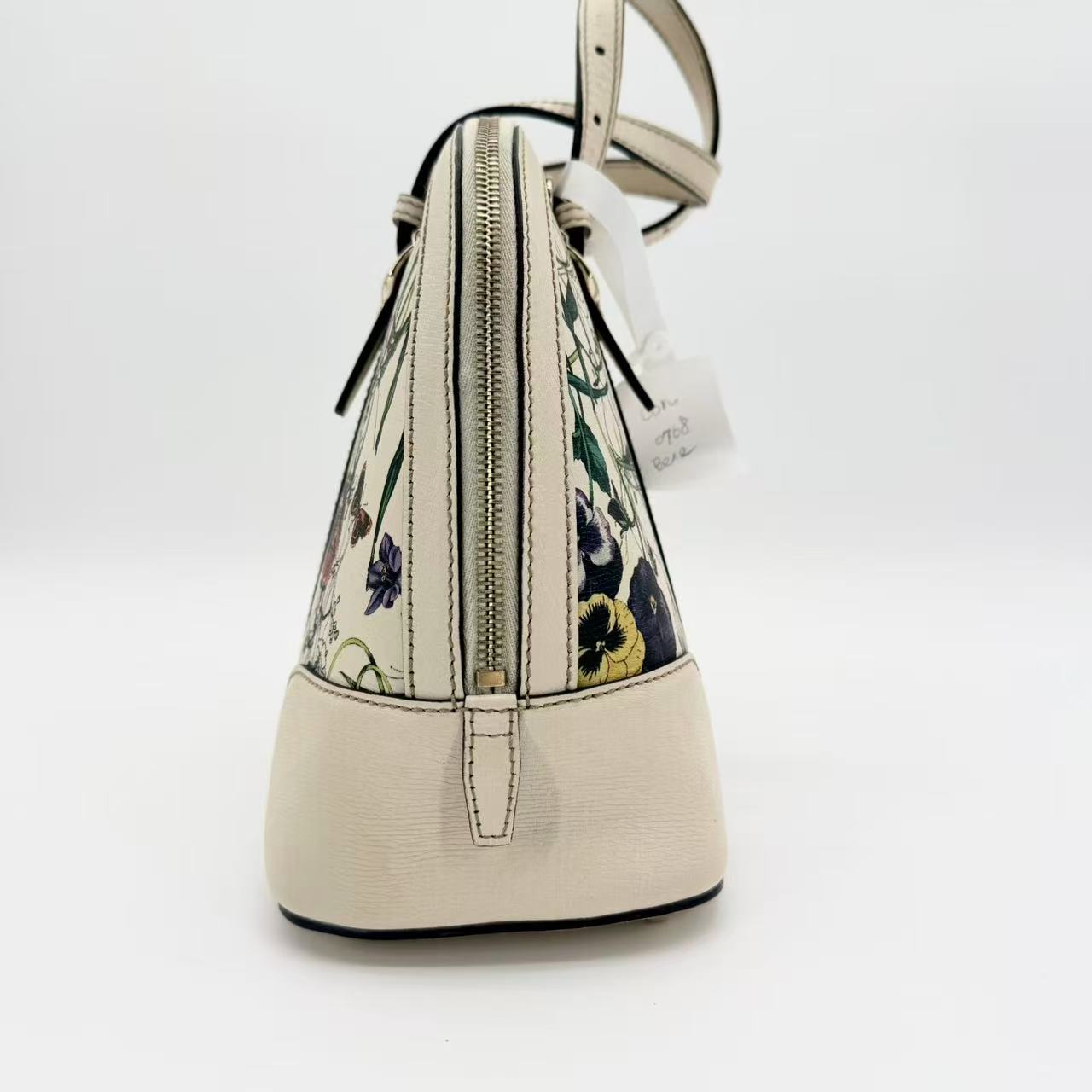 Flora Nice Dome Satchel in white with a multicolour floral print