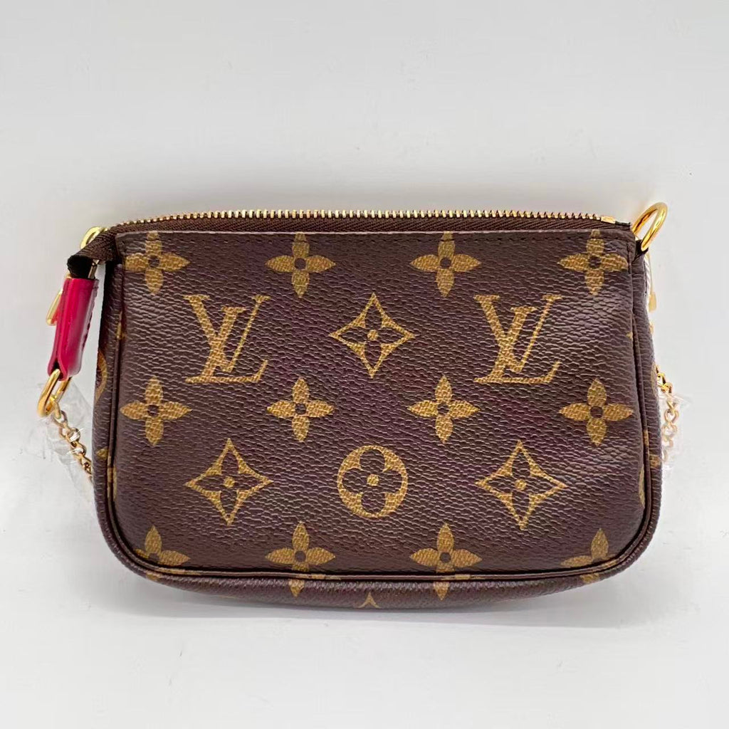 Pochette Accessoires Limited Edition Vivienne Xmas Monogram Canvas Mini