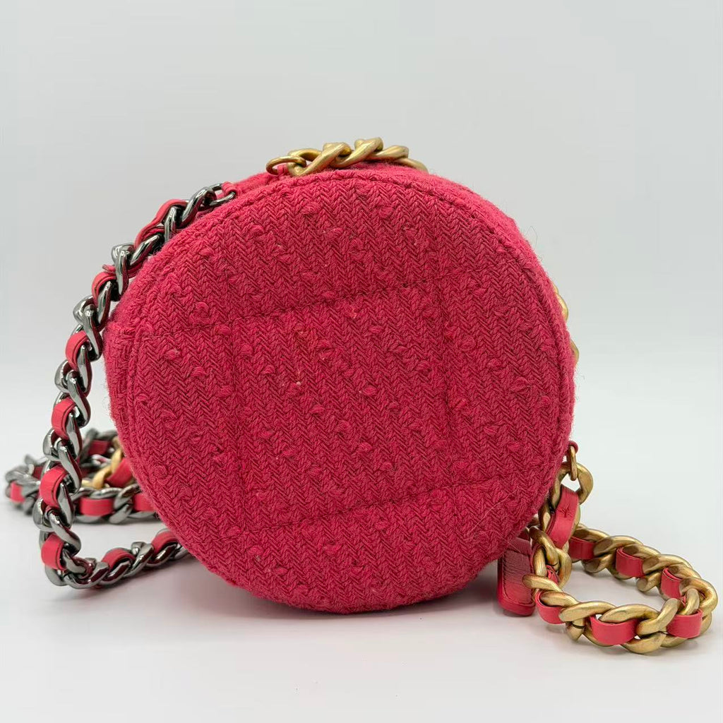 Chanel 19 Round Clutch in pink tweed