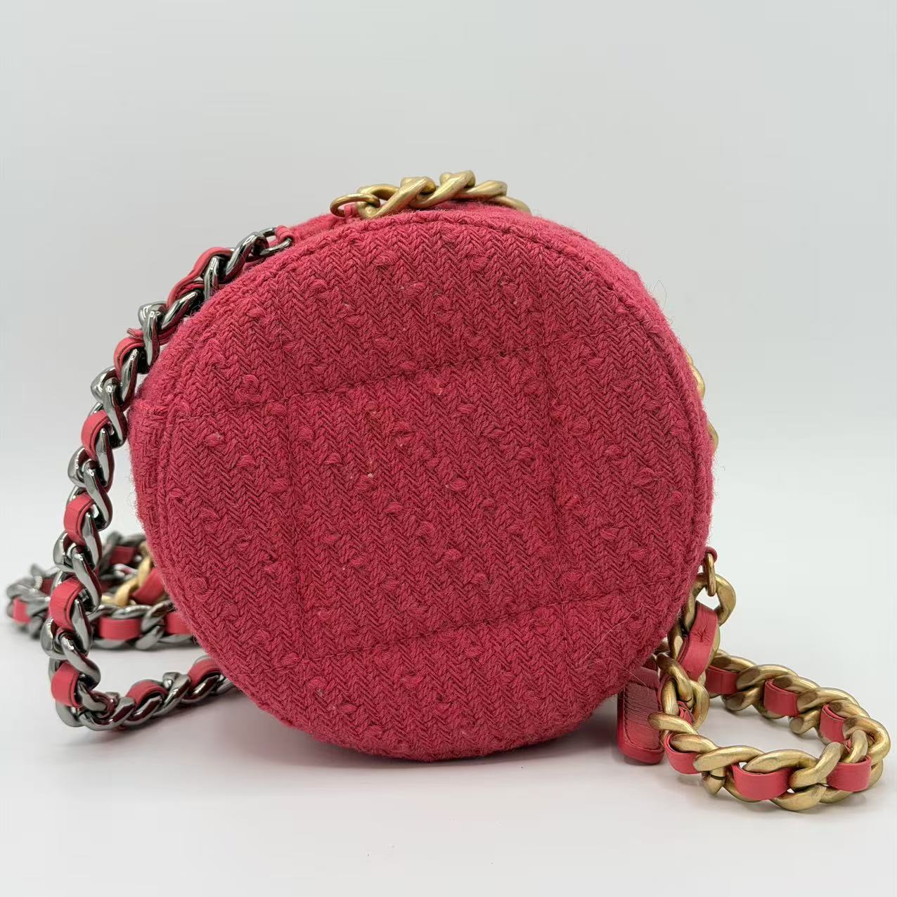 Chanel 19 Round Clutch in pink tweed