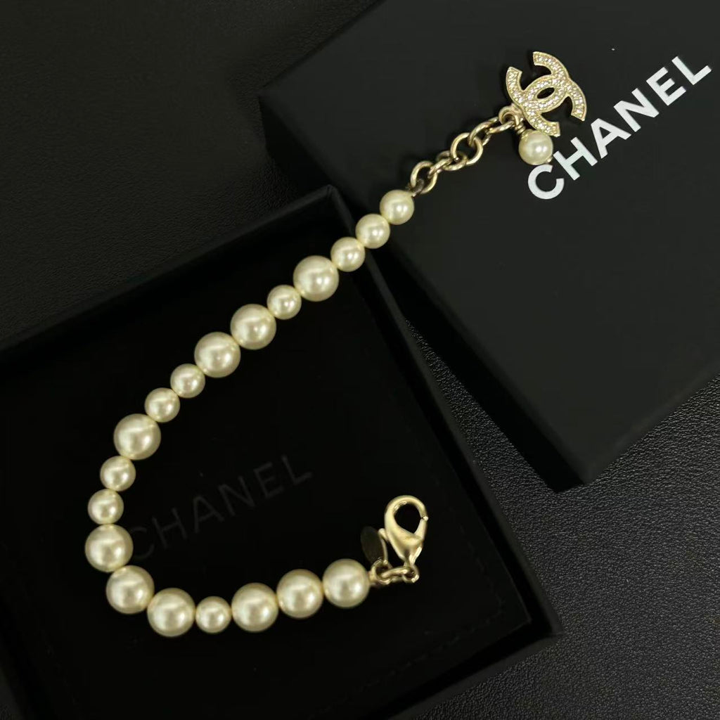 Chanel Faux Pearl and Goldtone CC Charm Bracelet twins LDZ328