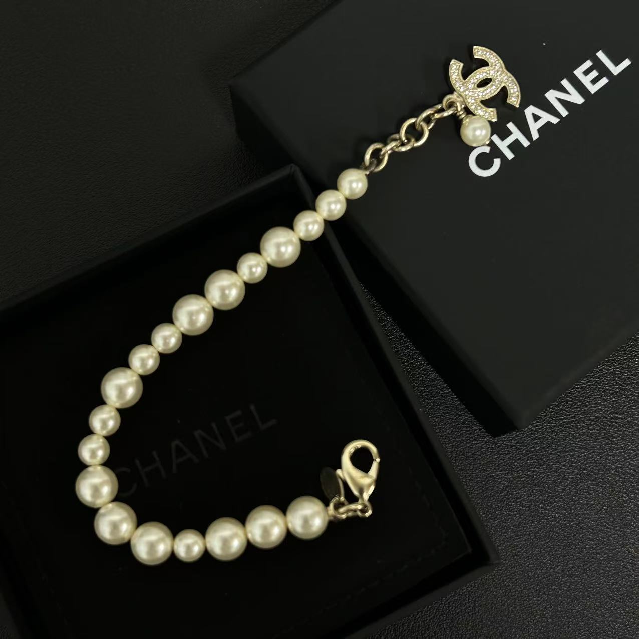 Chanel Faux Pearl and Goldtone CC Charm Bracelet twins LDZ328