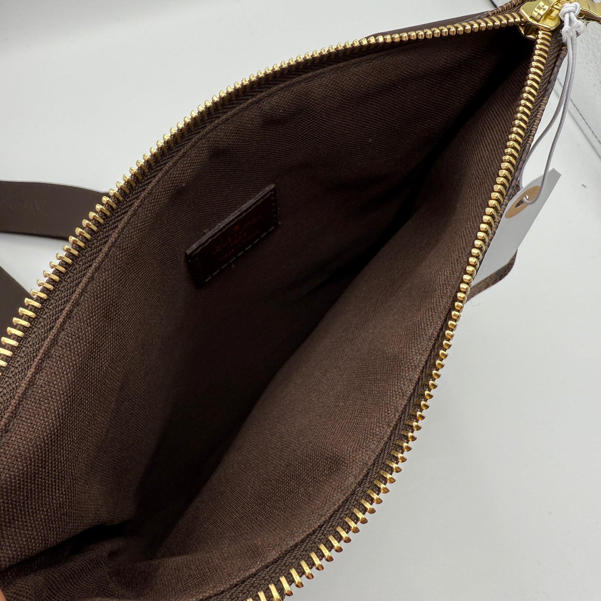 Damier Ebene Pochette Melville