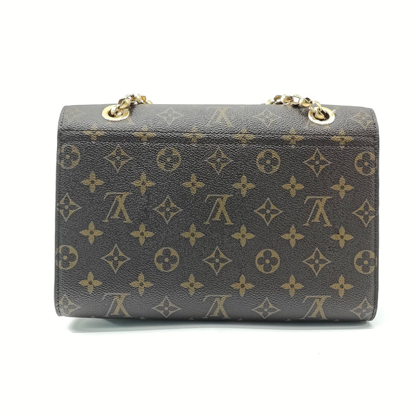 Victoire Handbag Monogram Canvas and Leather