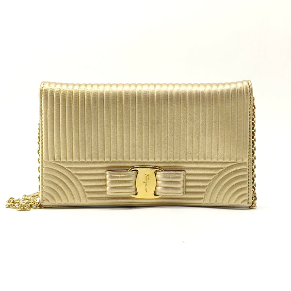 Metallic Gold Leather Vara Bow Chain Clutch