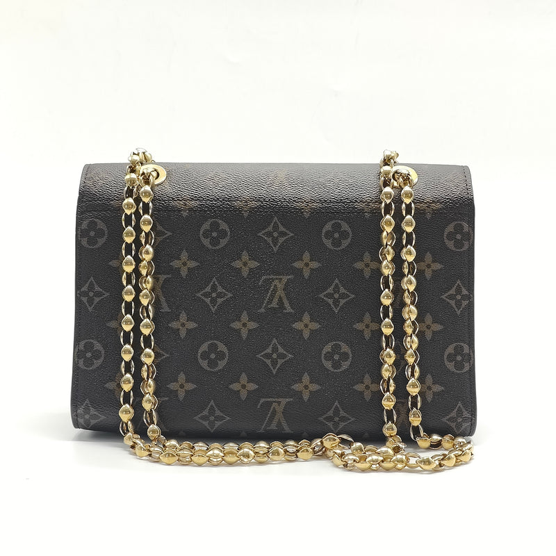 Victoire Handbag Monogram Canvas and Leather