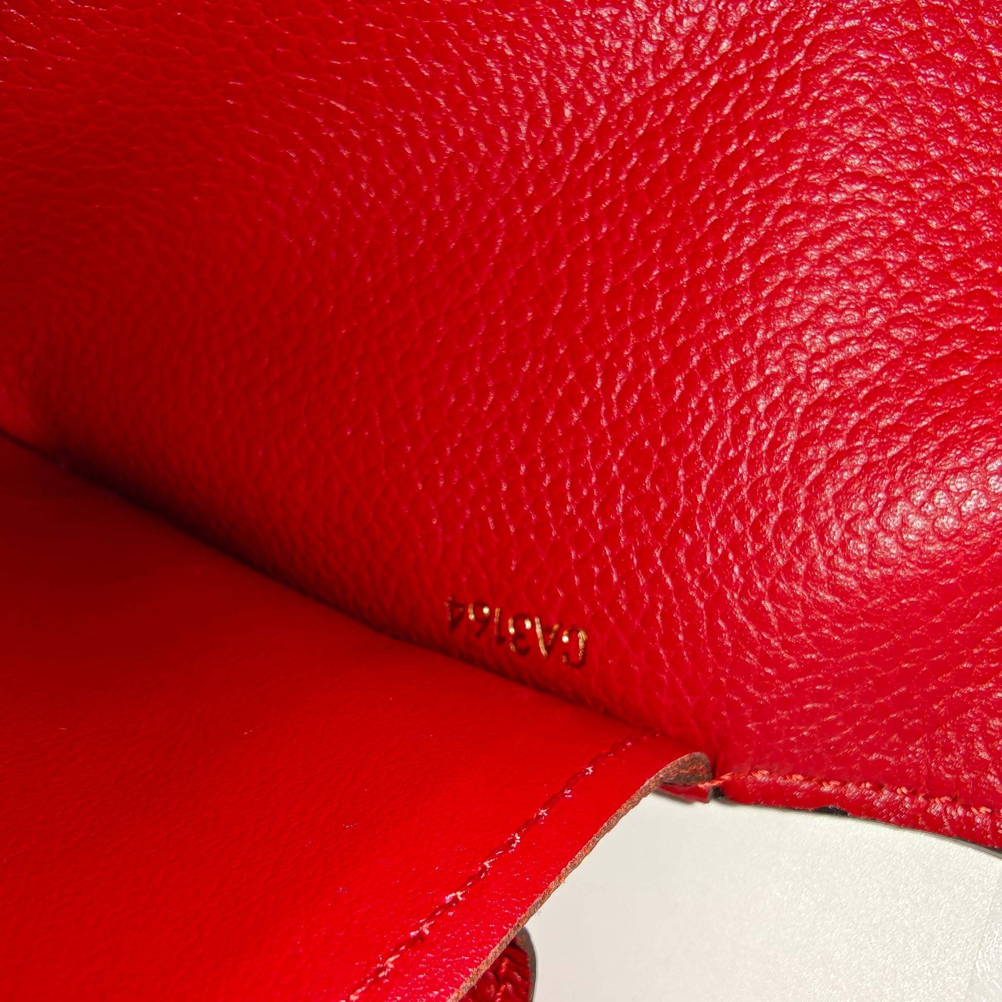 Sarah Wallet NM Monogram Empreinte Leather