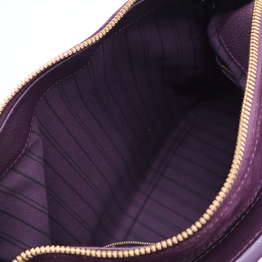 Aube Monogram Empreinte Leather Audacieuse MM Bag B20210