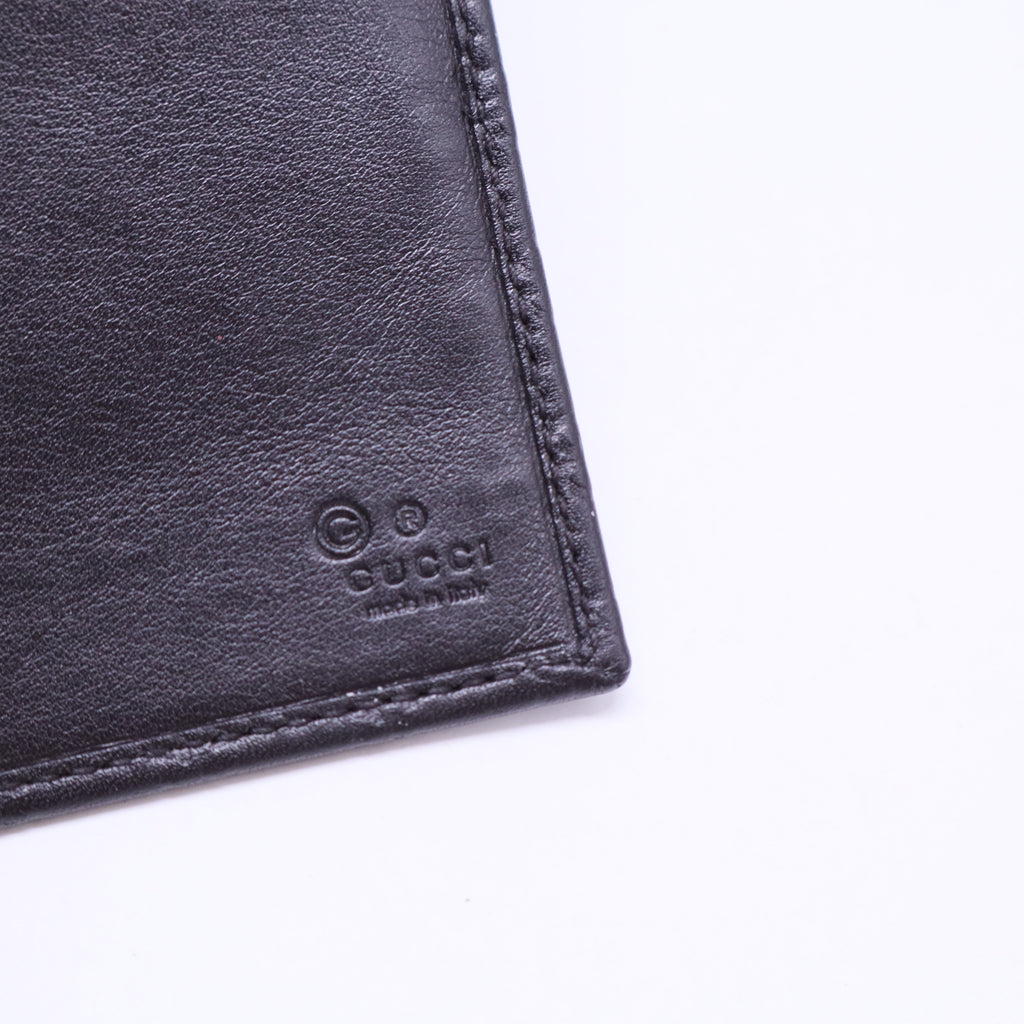 Black Micro Guccissima Leather Continental Wallet W20401