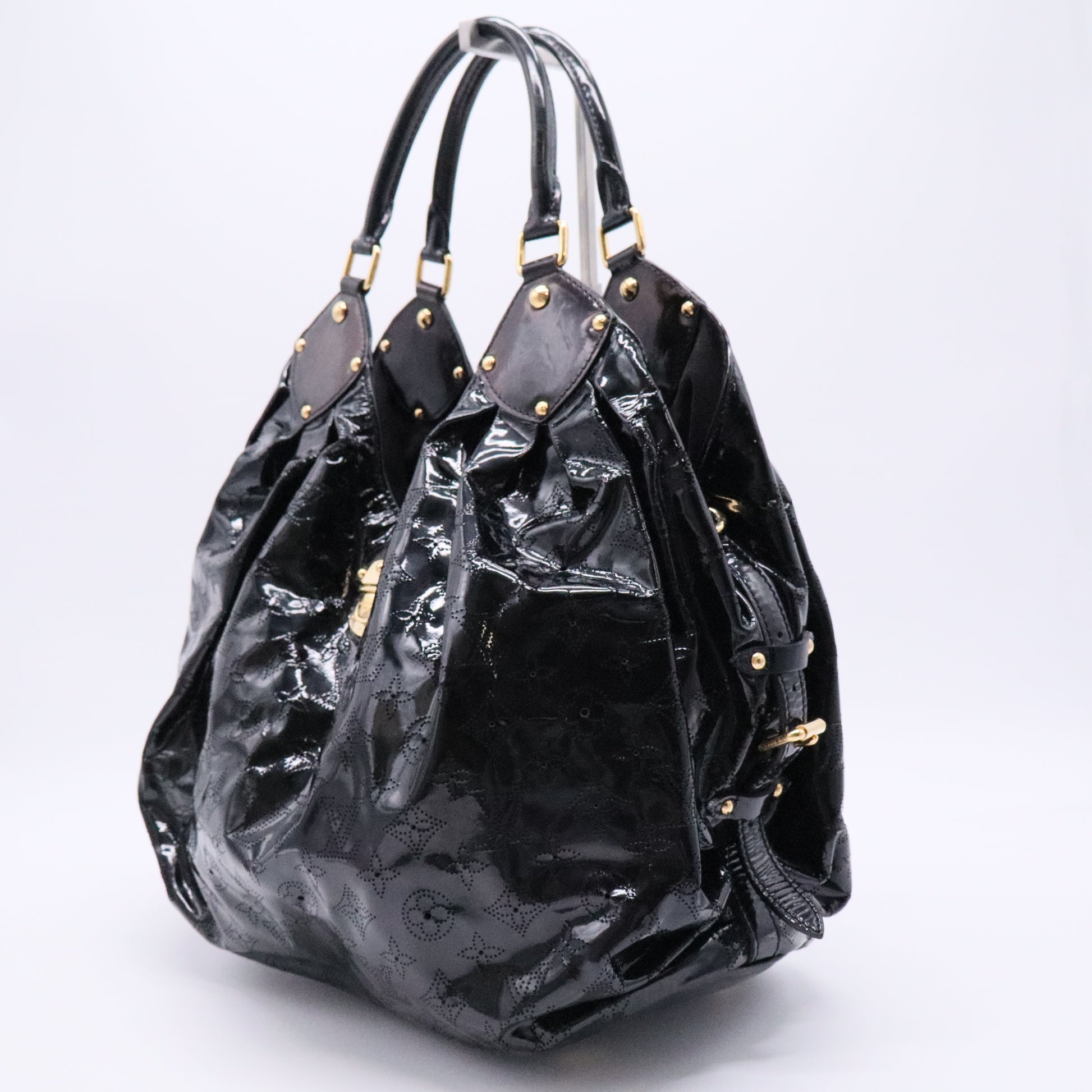 Louis Vuitton L Hobo Surya Leather Twins