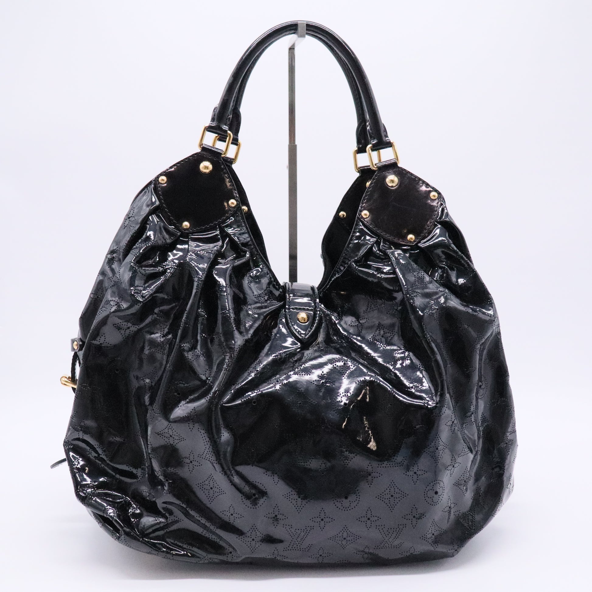 Louis Vuitton L Hobo Surya Leather Twins