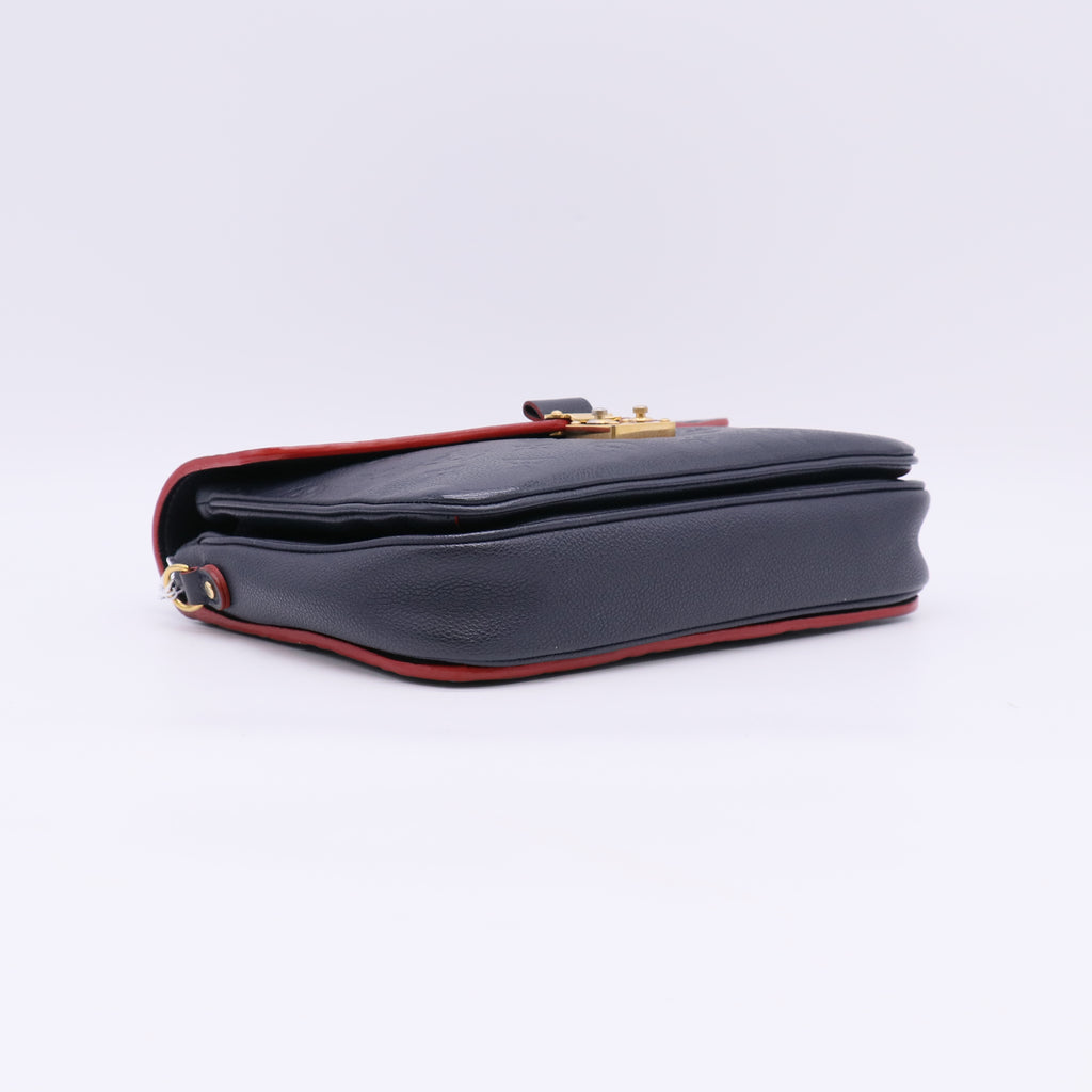 Louis Vuitton Pochette Metis in Monogram Empreinte Marine Rouge twins LDZ978