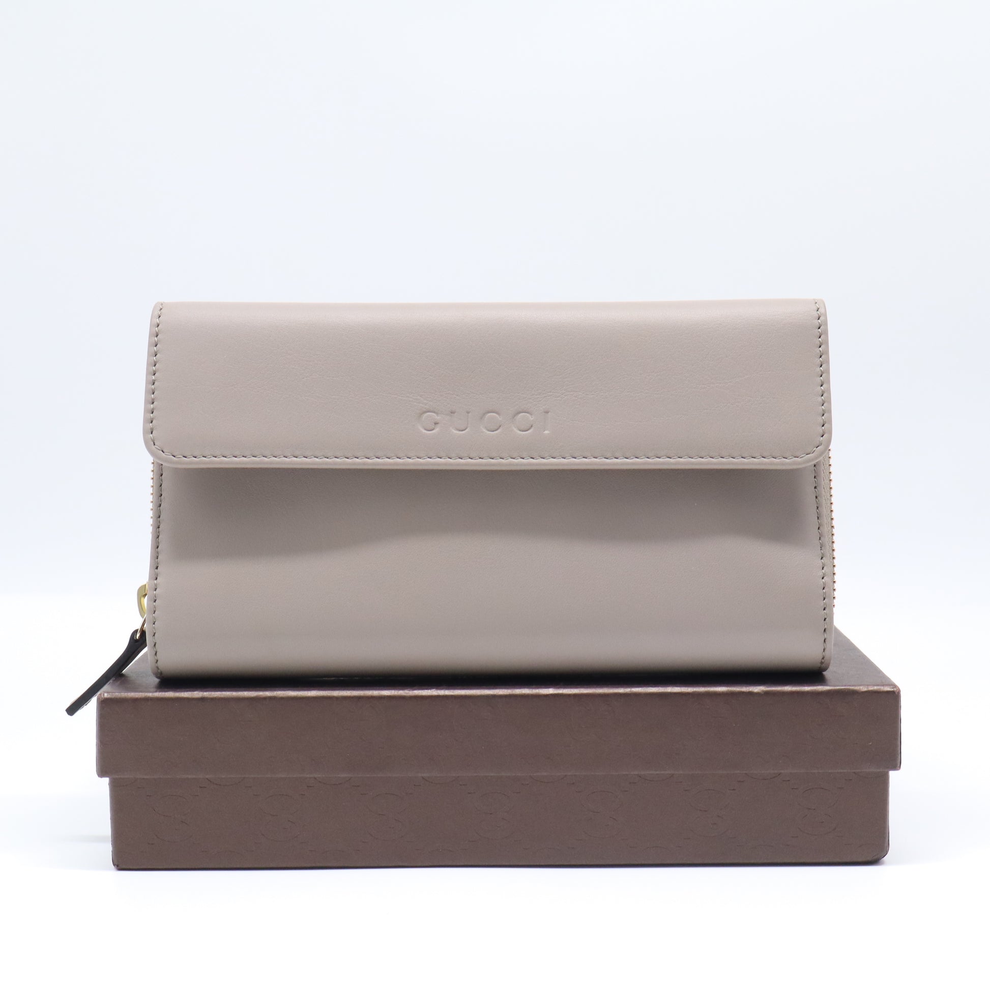 Gucci Embossed Logo Leather Flap Long Wallet W21640