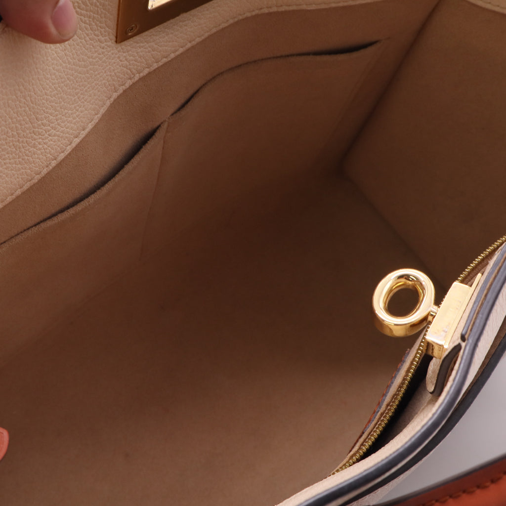 Louis Vuitton Galet Grained Leather Tufted On My Side Bag twins