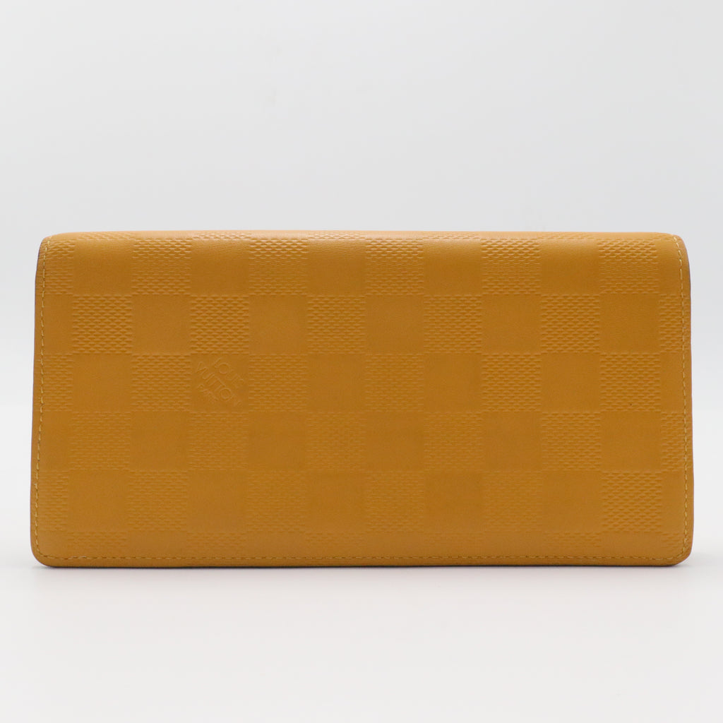 Brazza Wallet Damier Graphite Yellow