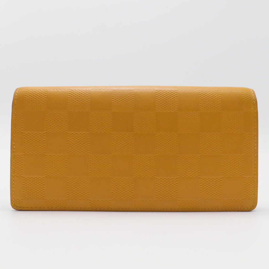 Brazza Wallet Damier Graphite Yellow