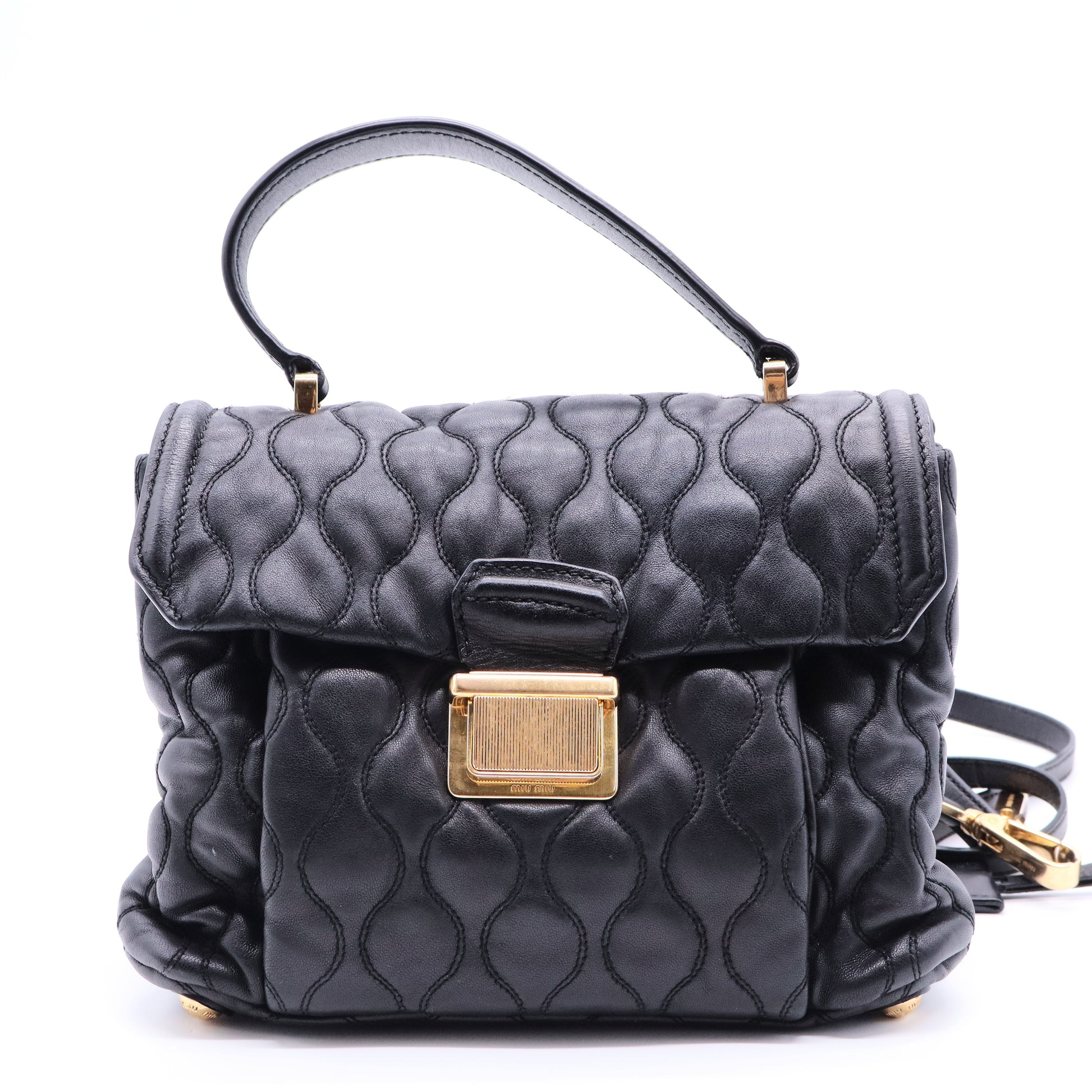 Miu Miu Matelassé 2-way leather bag in black and gold gisel