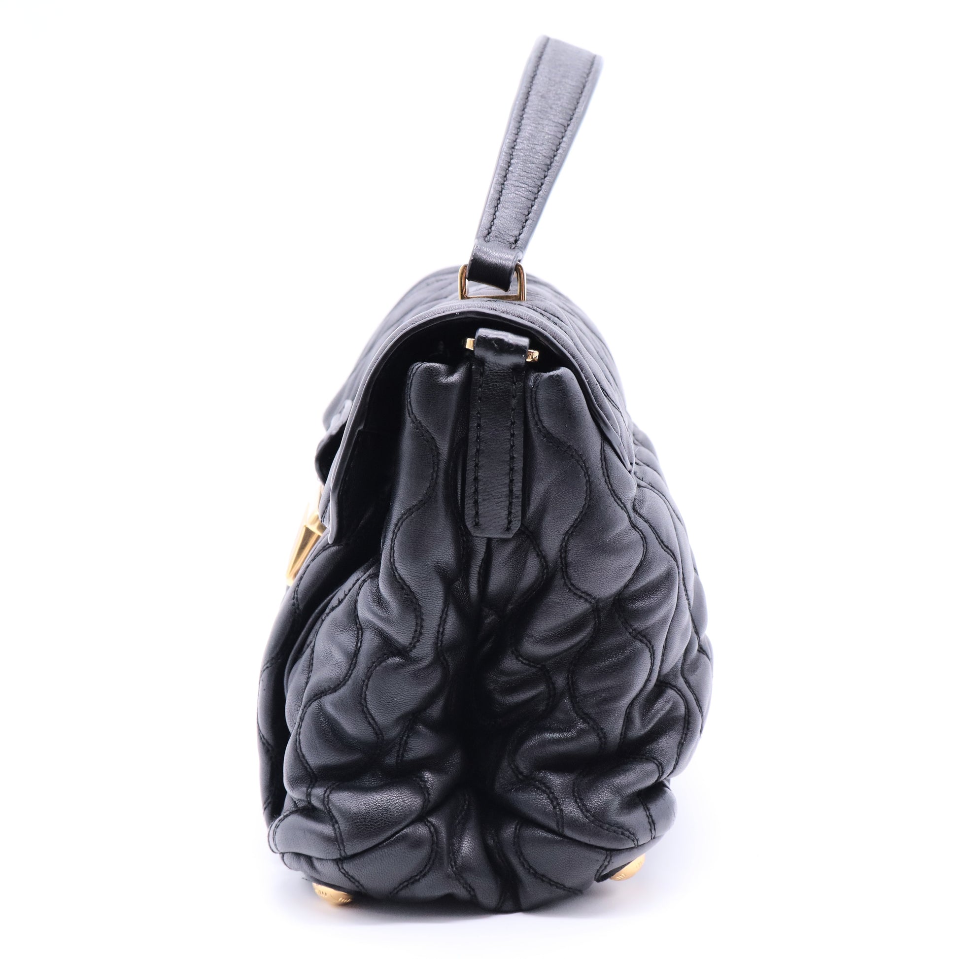 Miu Miu Matelassé 2-way leather bag in black and gold gisel