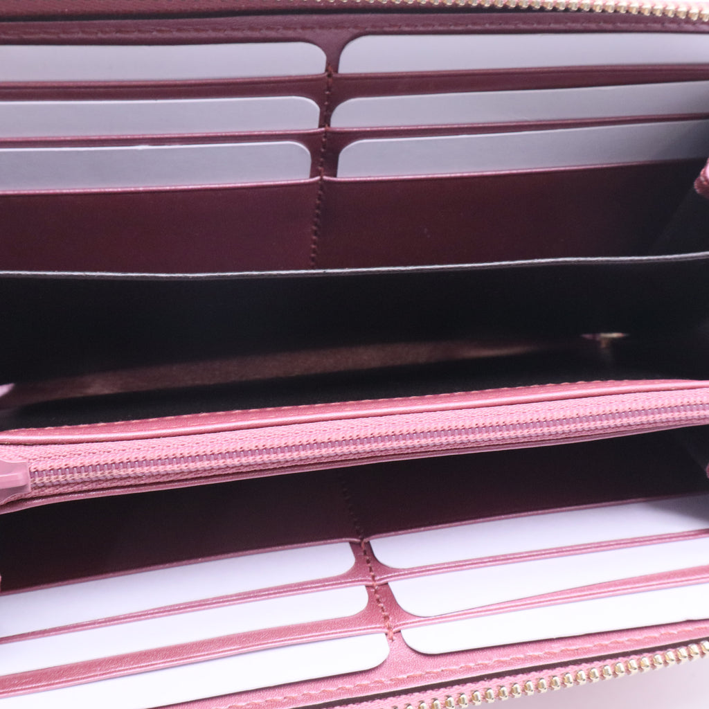 Pink Guccissima metallic wallet