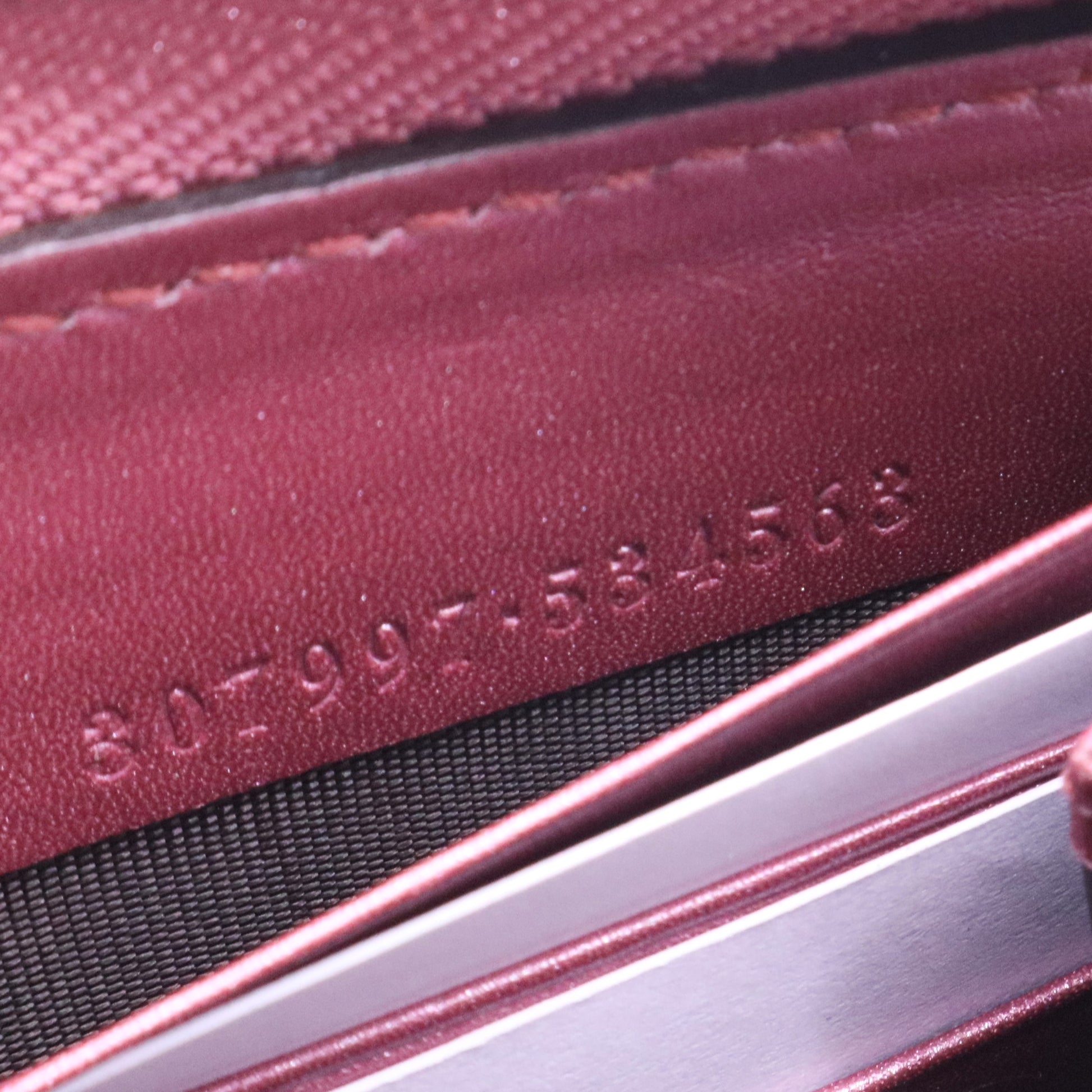 Pink Guccissima metallic wallet