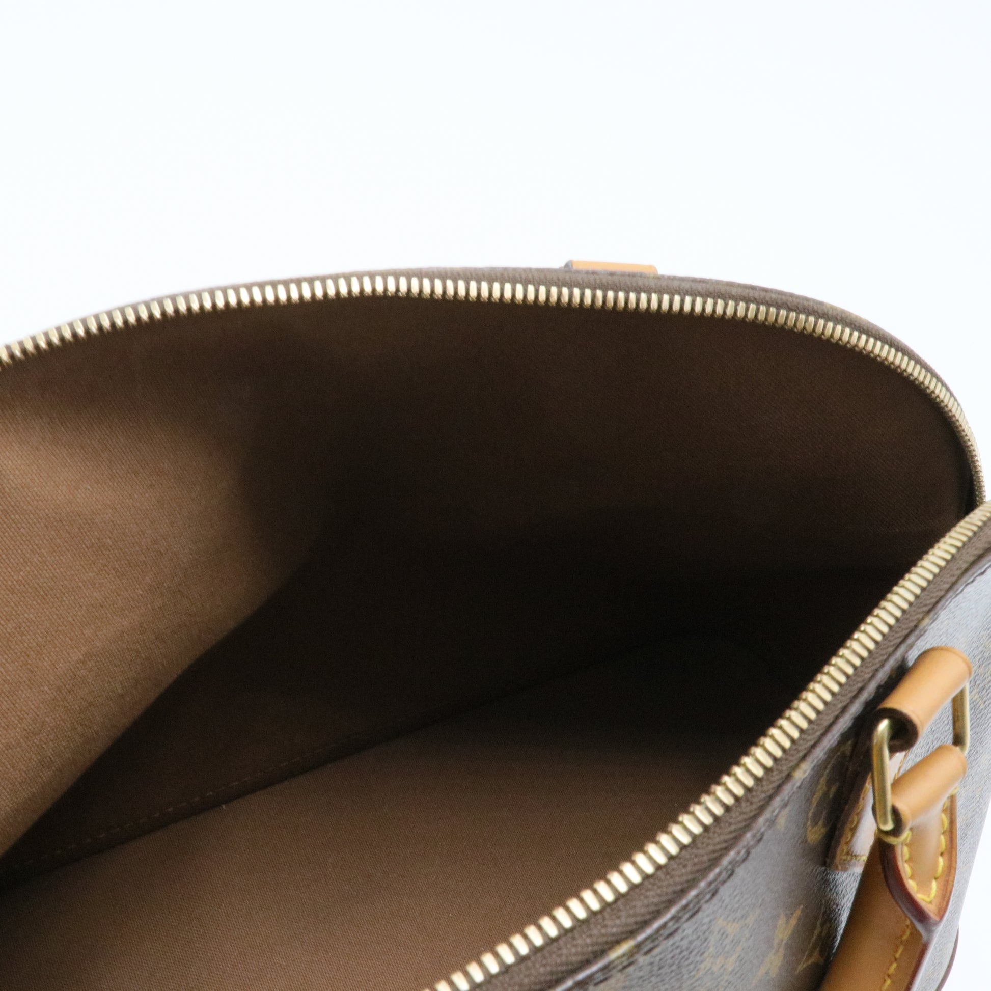 Alma Handbag Monogram Canvas PM