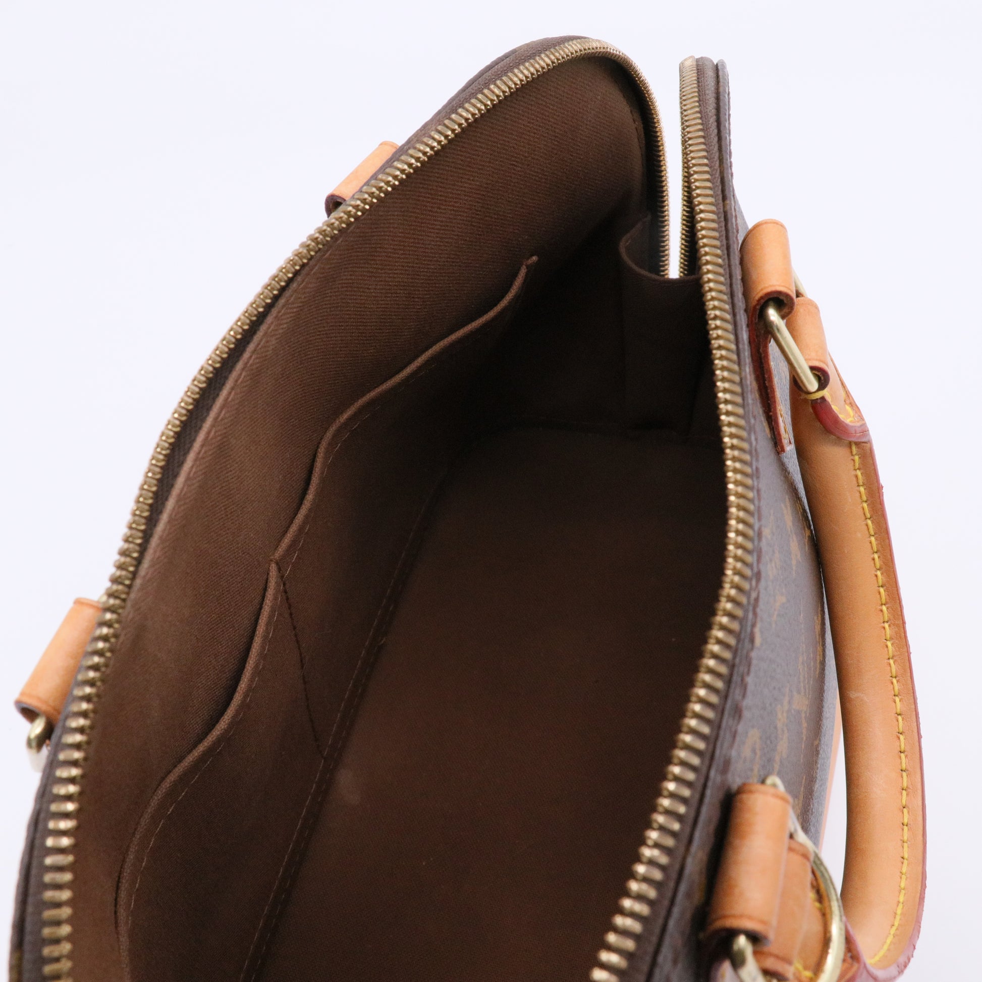 Alma Handbag Monogram Canvas PM Twins