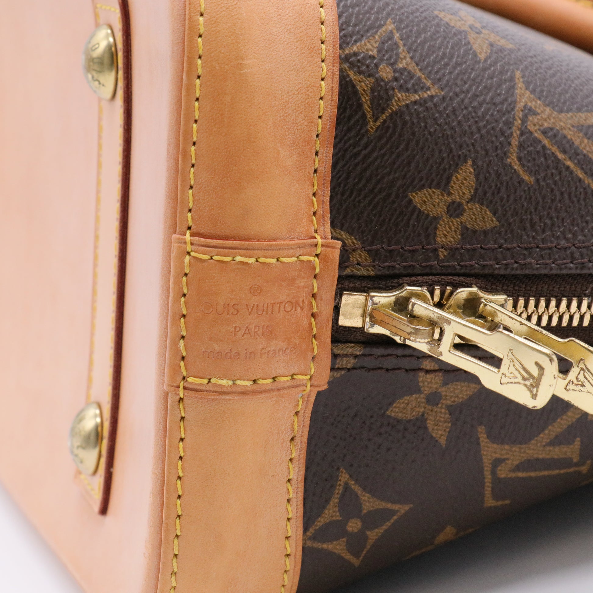 Alma Handbag Monogram Canvas PM Twins