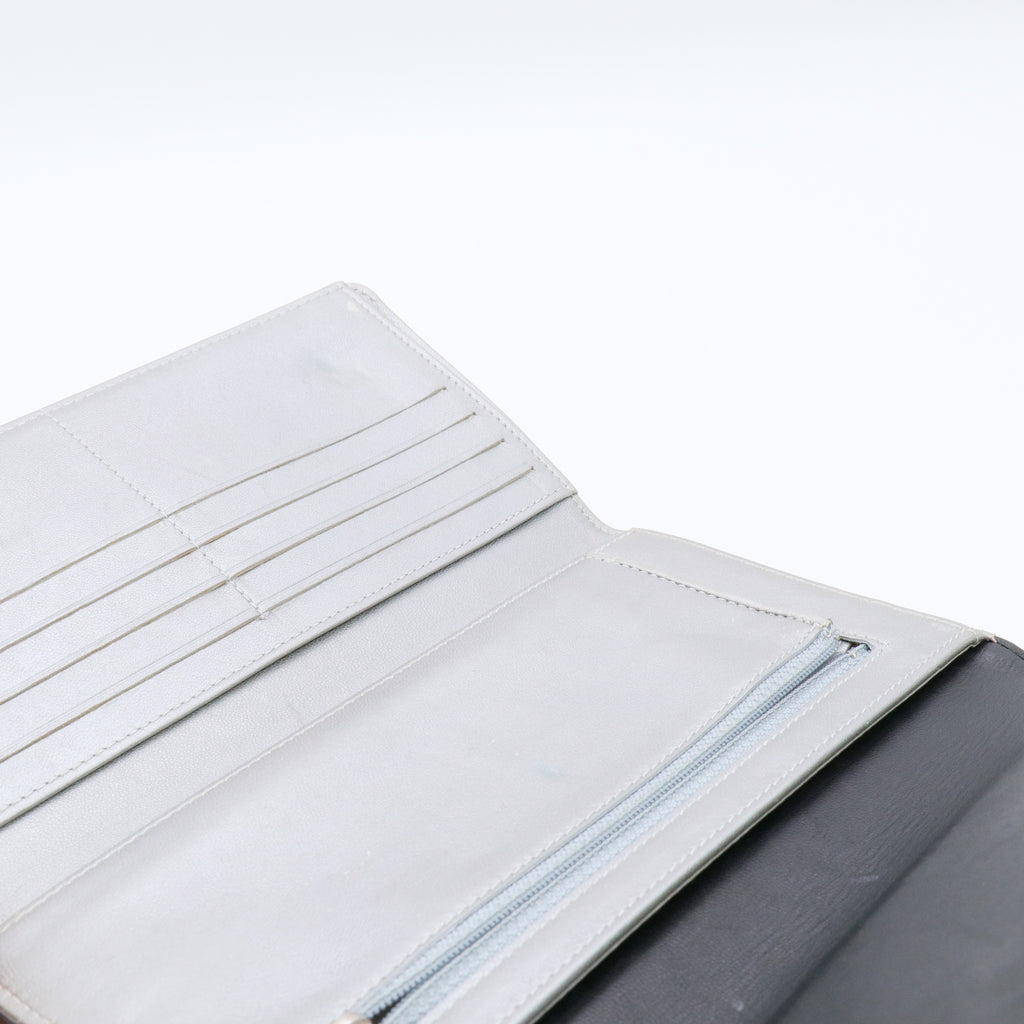 Lambskin Embossed Camellia Large Gusset Flap Wallet Black twins