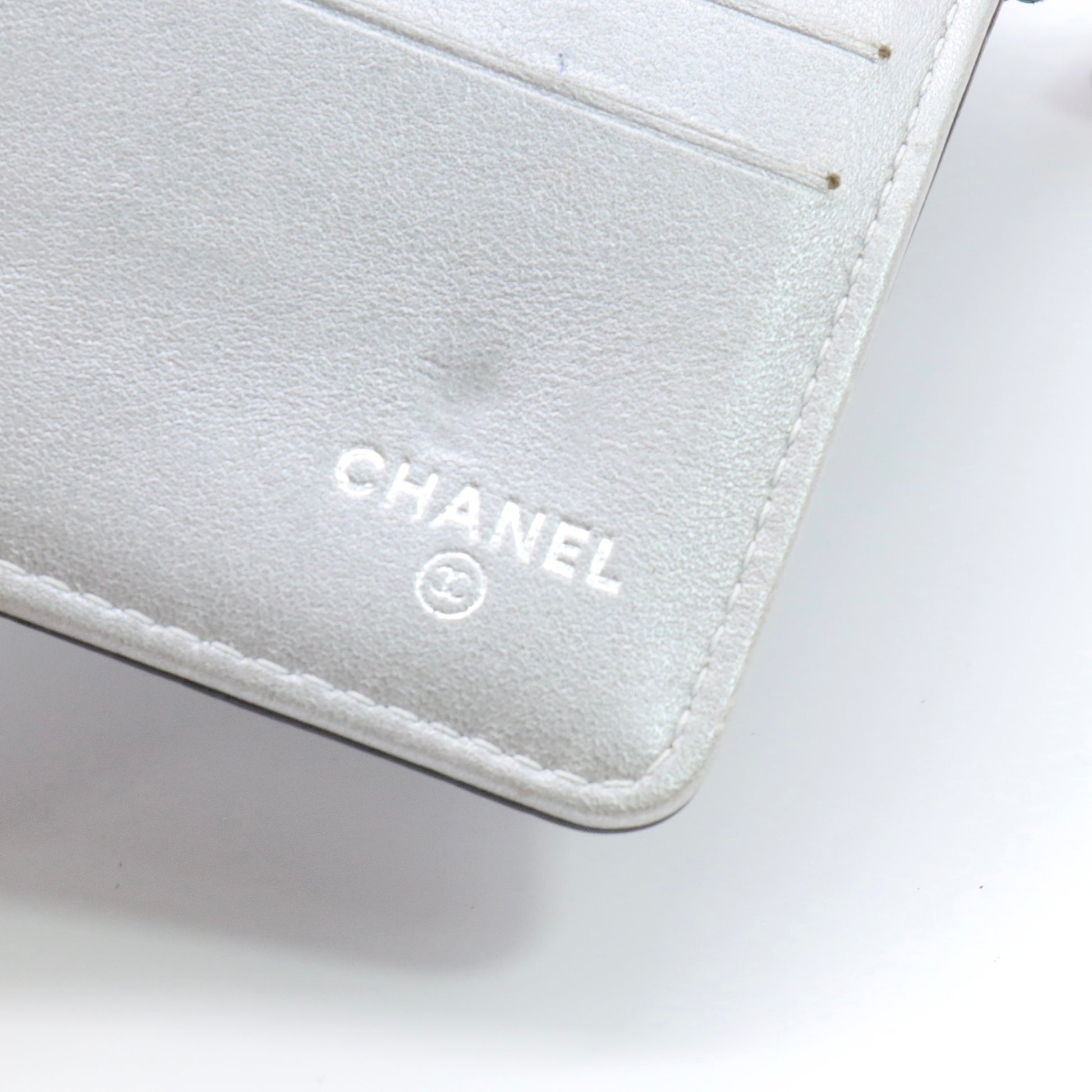 Lambskin Embossed Camellia Large Gusset Flap Wallet Black twins