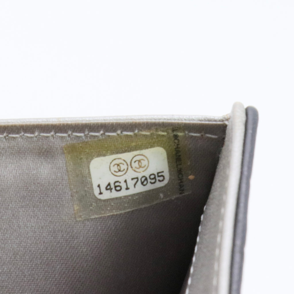 Lambskin Embossed Camellia Large Gusset Flap Wallet Black twins