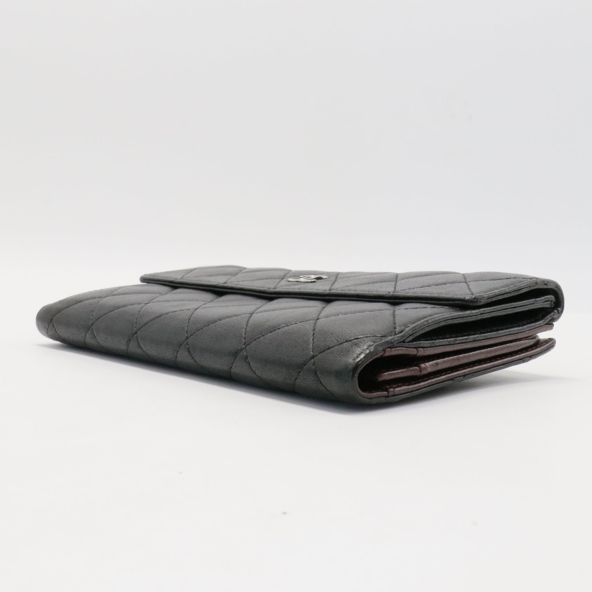 Bi-fold long wallet black gold matelasse