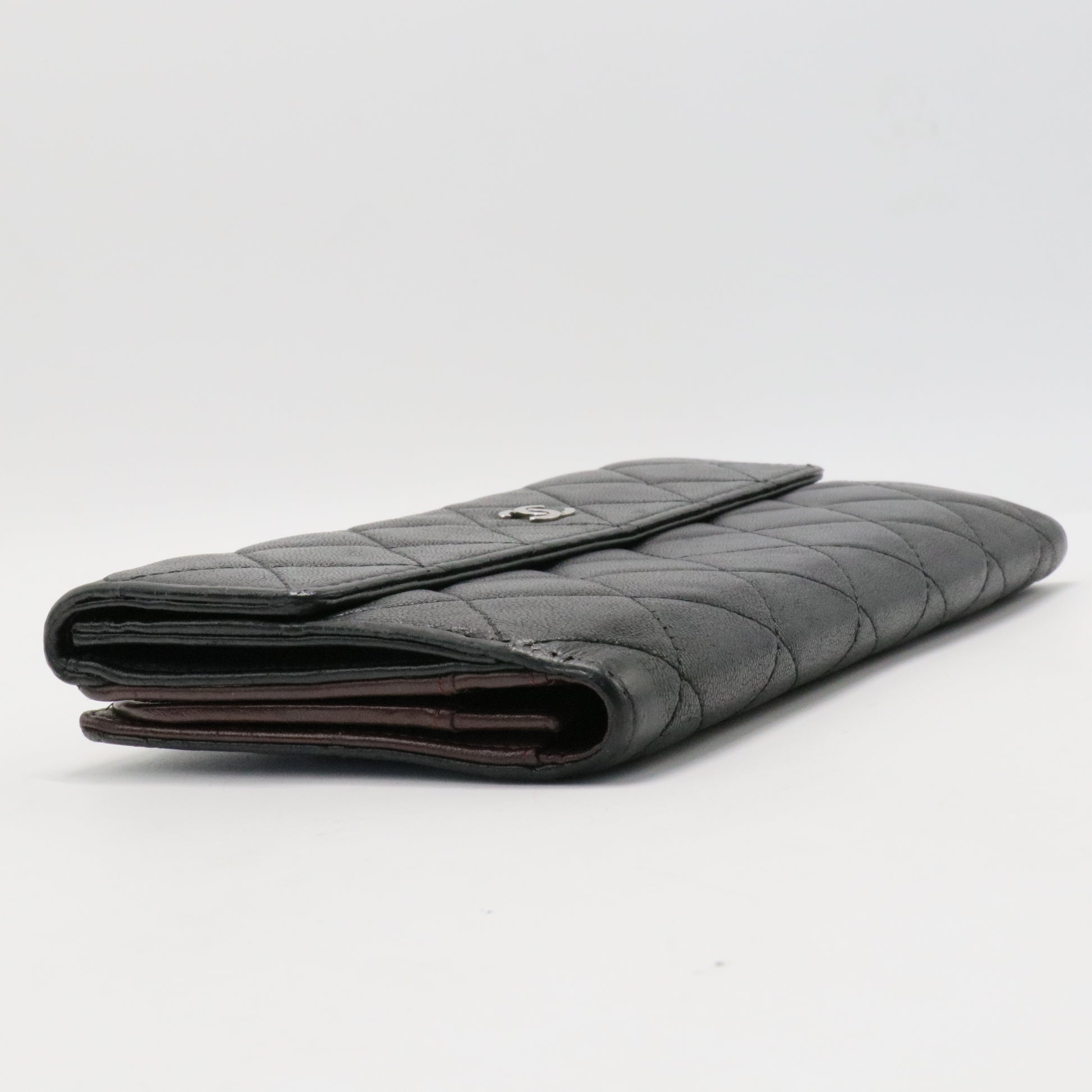 Bi-fold long wallet black gold matelasse
