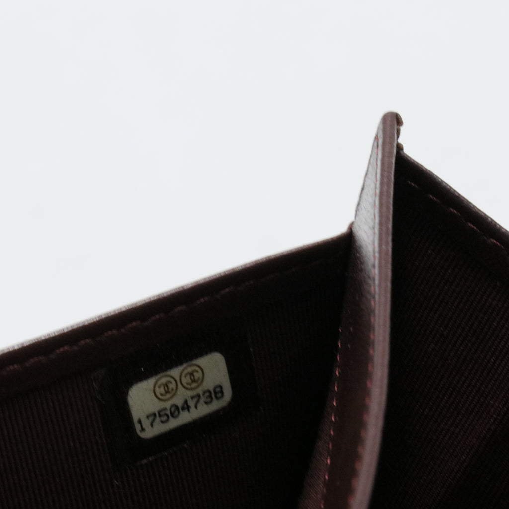 Bi-fold long wallet black gold matelasse