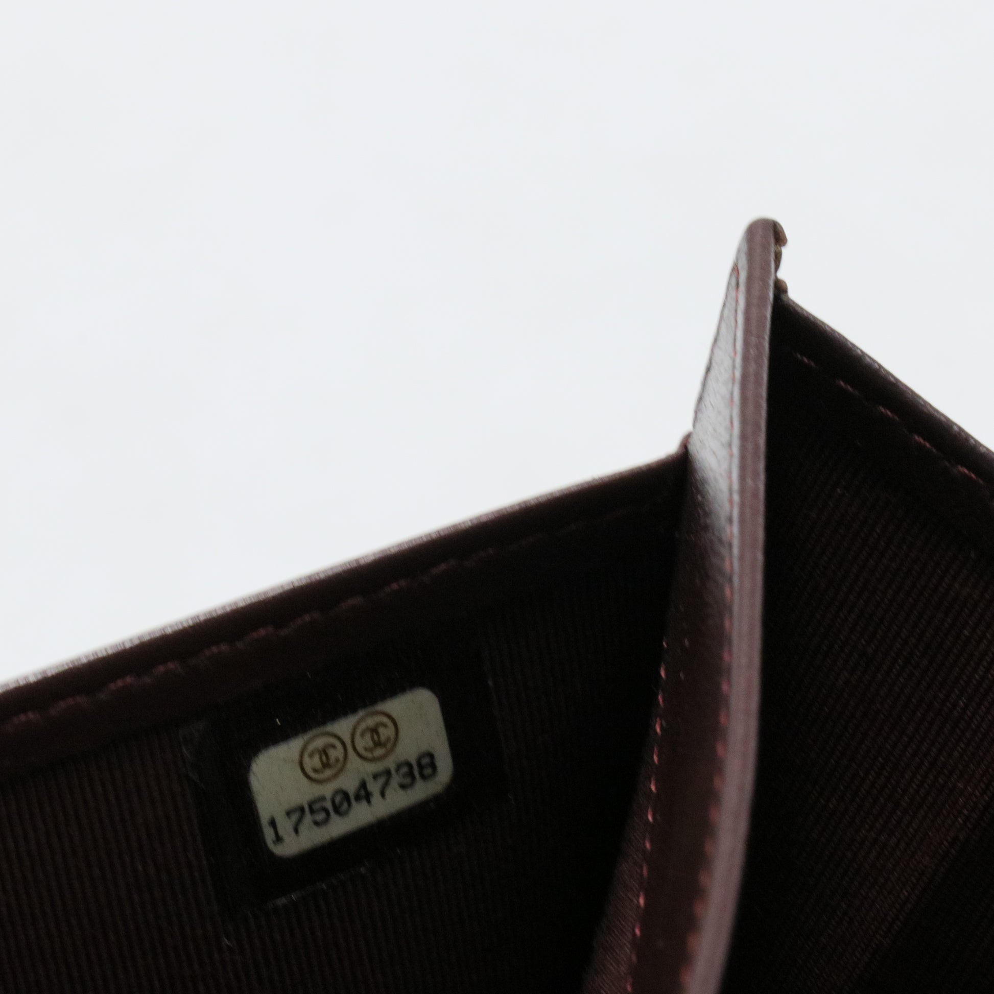 Bi-fold long wallet black gold matelasse