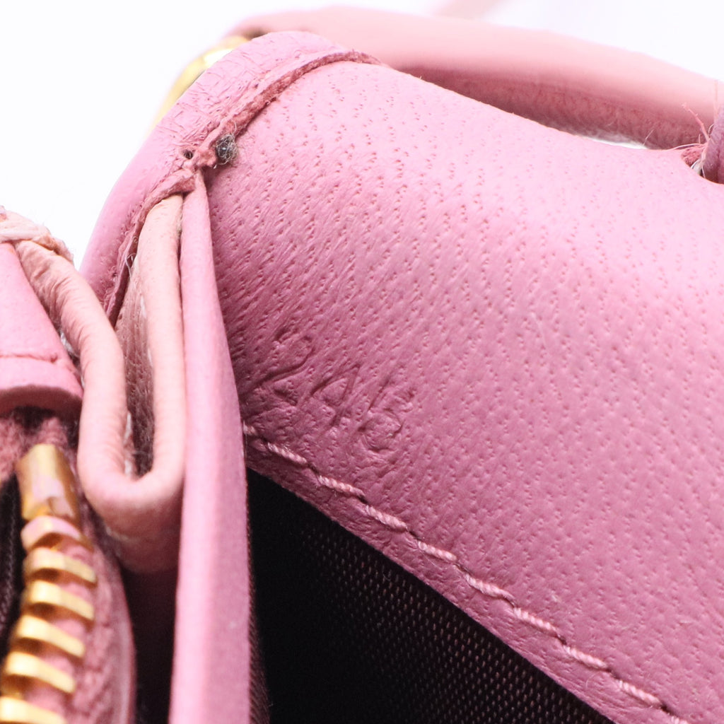 leather small goods light pinl matelasse clutch