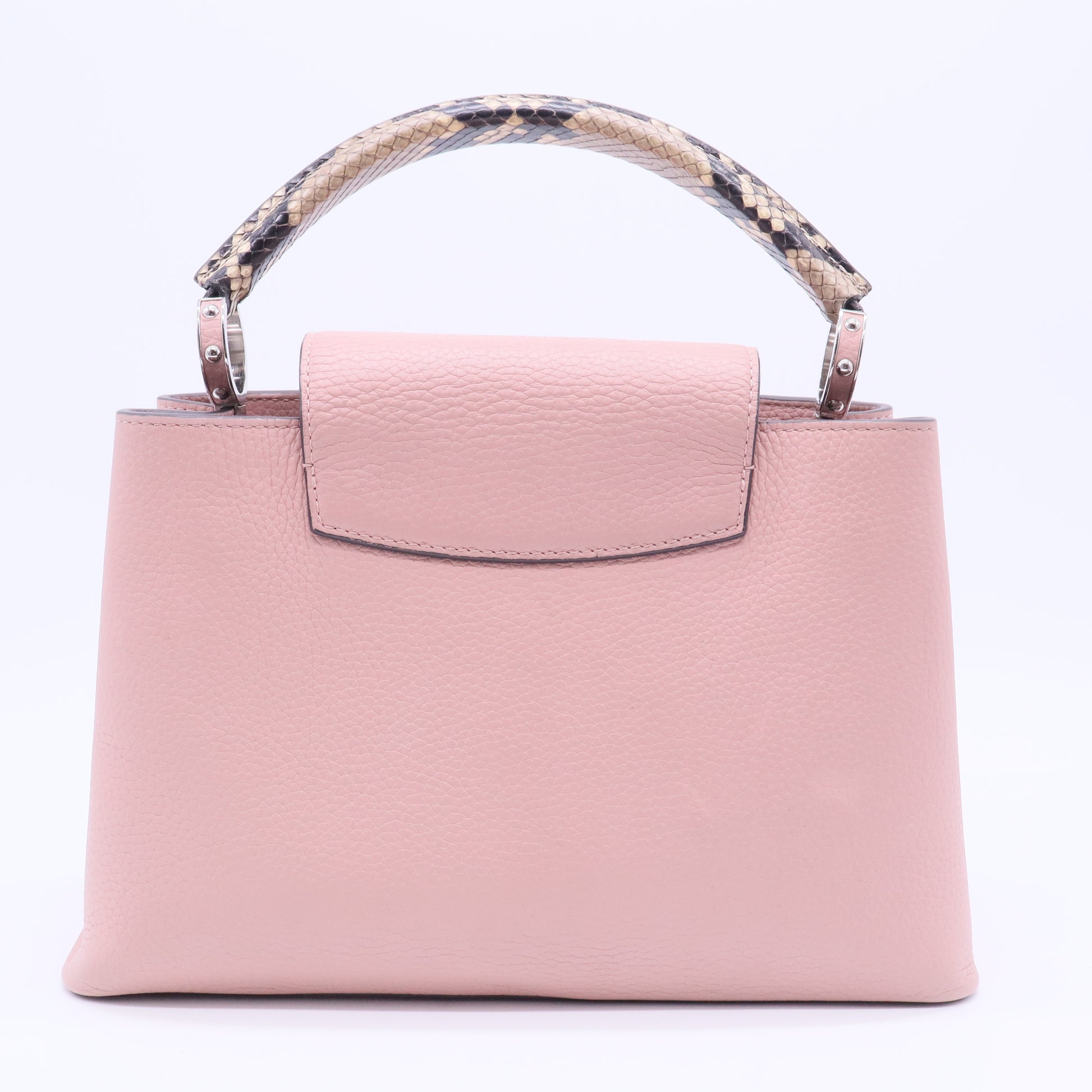 Capucines BB handbag in pink Taurillon leather with a python handle