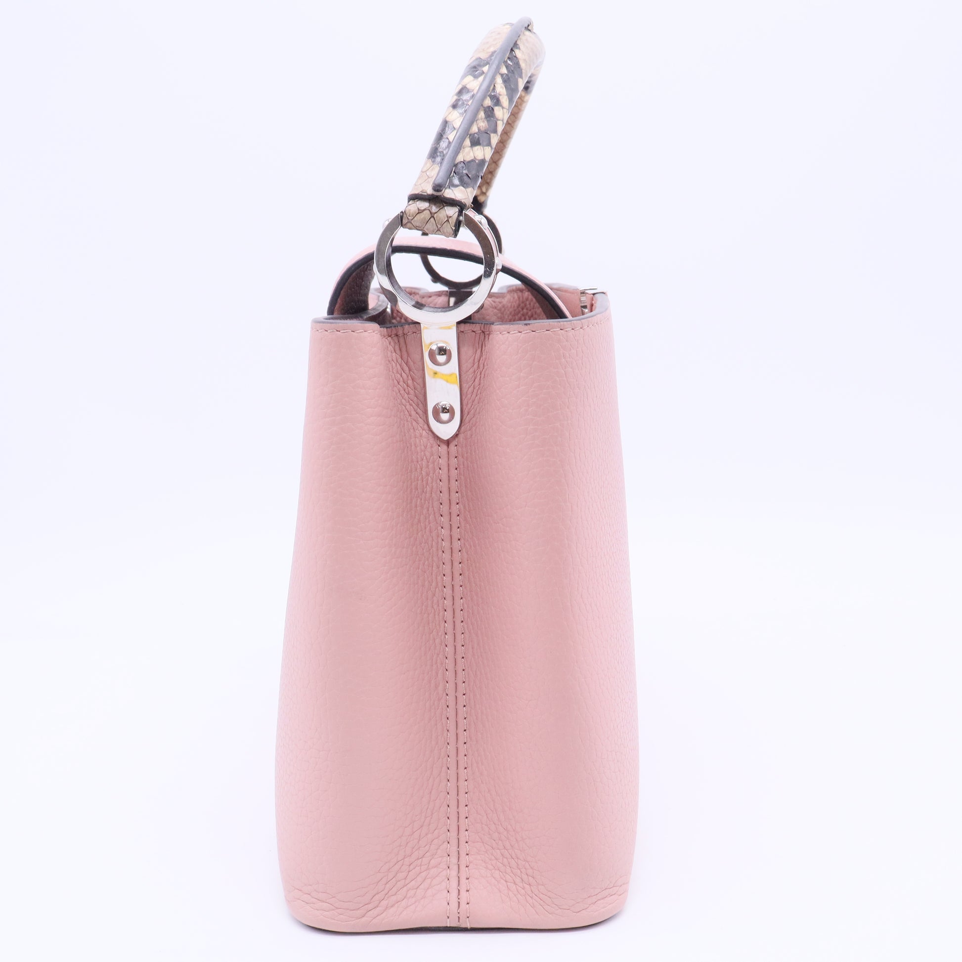 Capucines BB handbag in pink Taurillon leather with a python handle