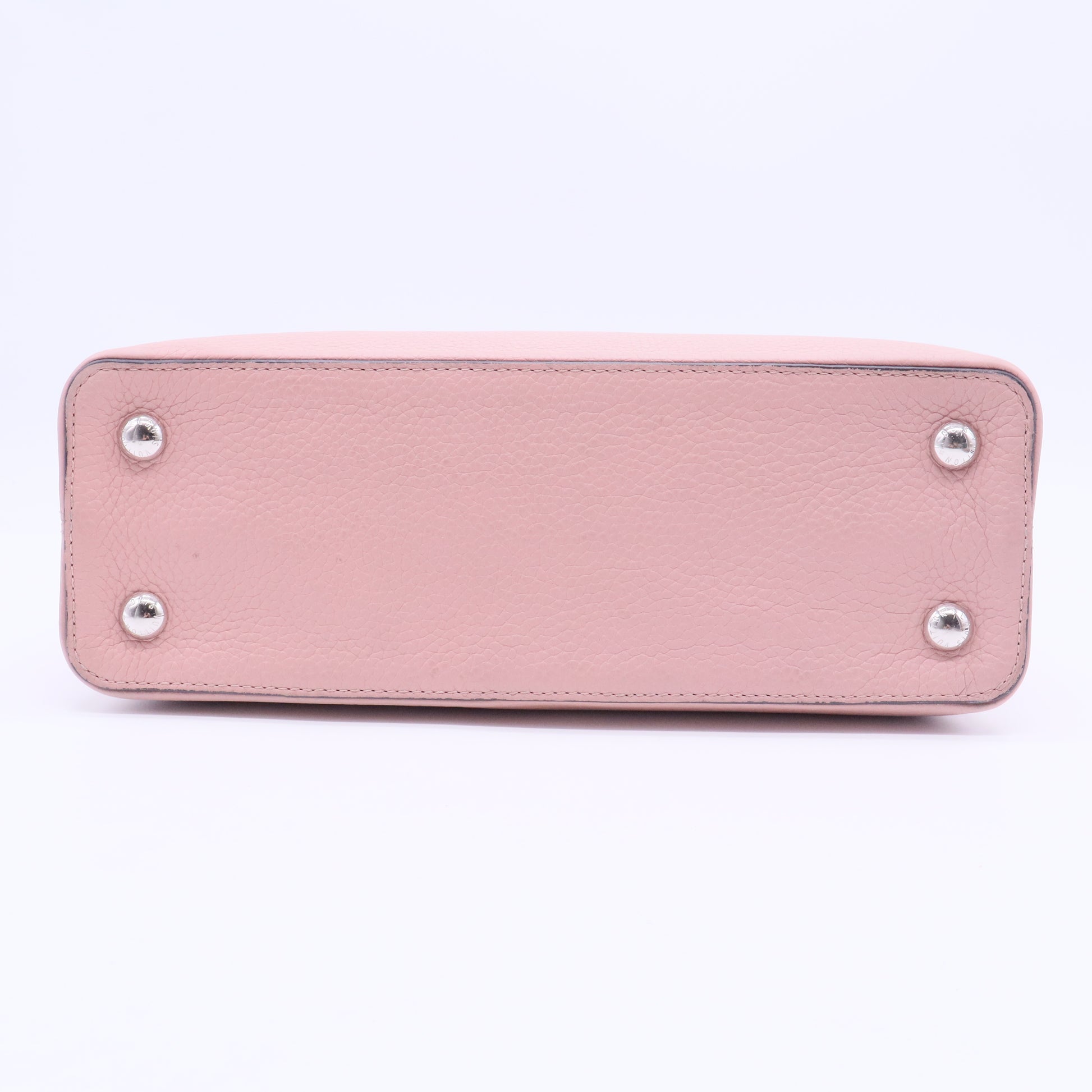 Capucines BB handbag in pink Taurillon leather with a python handle