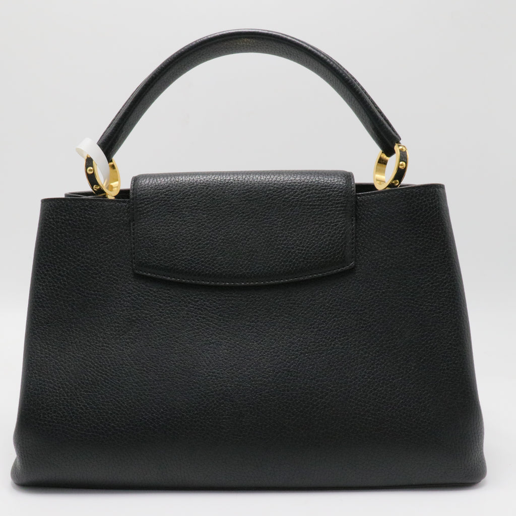 Taurillon Capucines MM Black Fuchsia