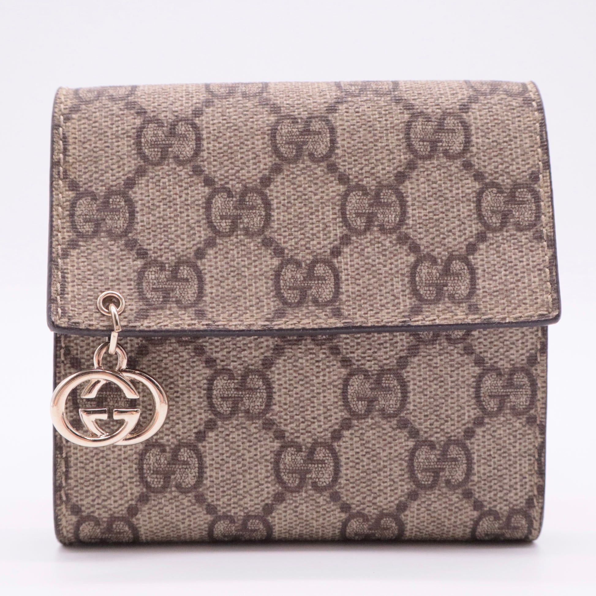GG Supreme Monogram GG Pierce French Flap Wallet twins