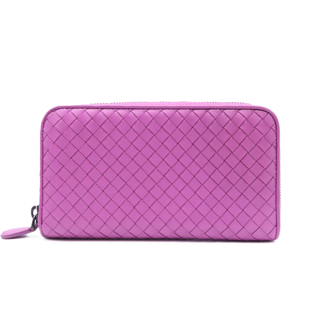 Bottega Veneta Intrecciato leather zip-around wallet in a purple or orchid color