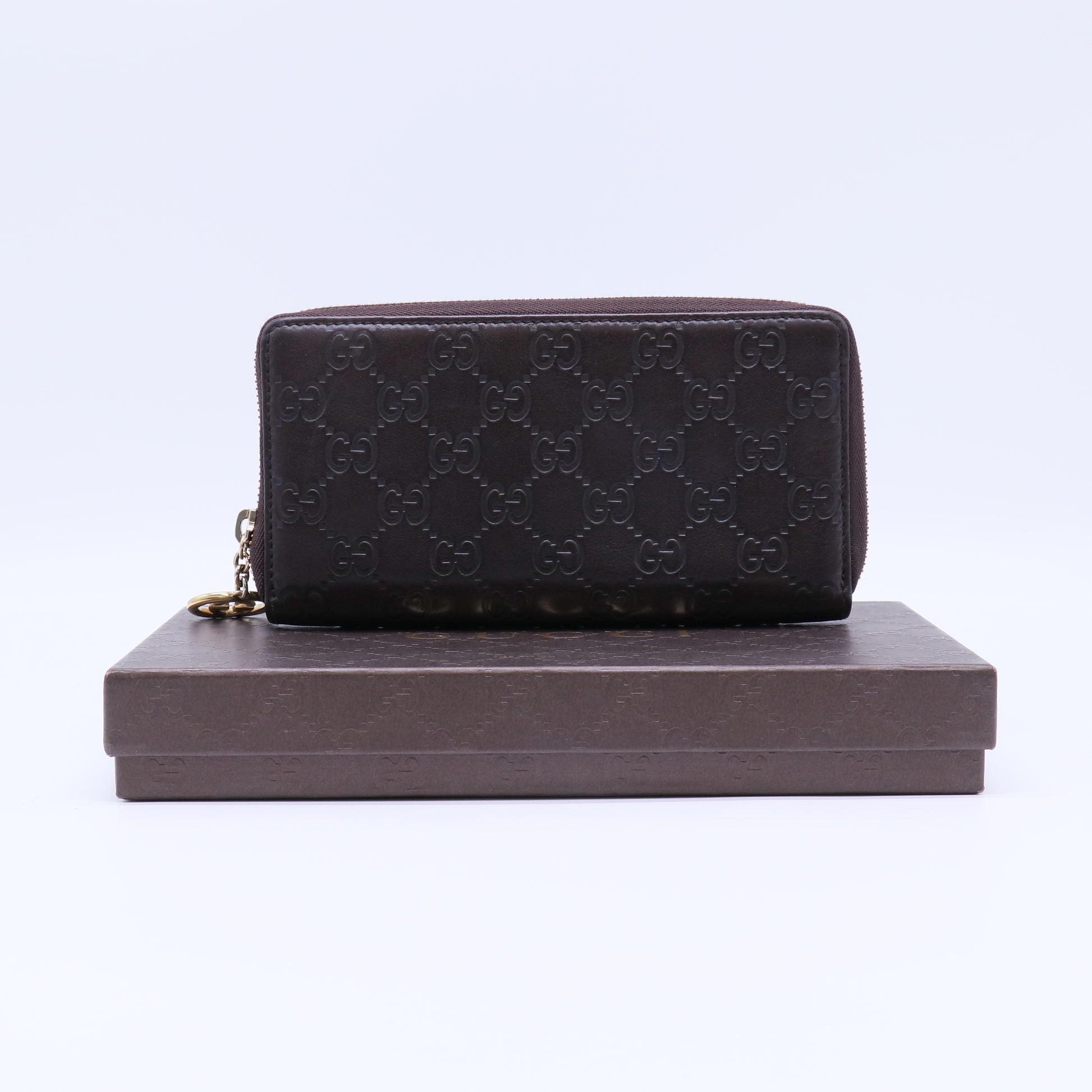 Gucci Signature Leather Zip Around Wallet W21696