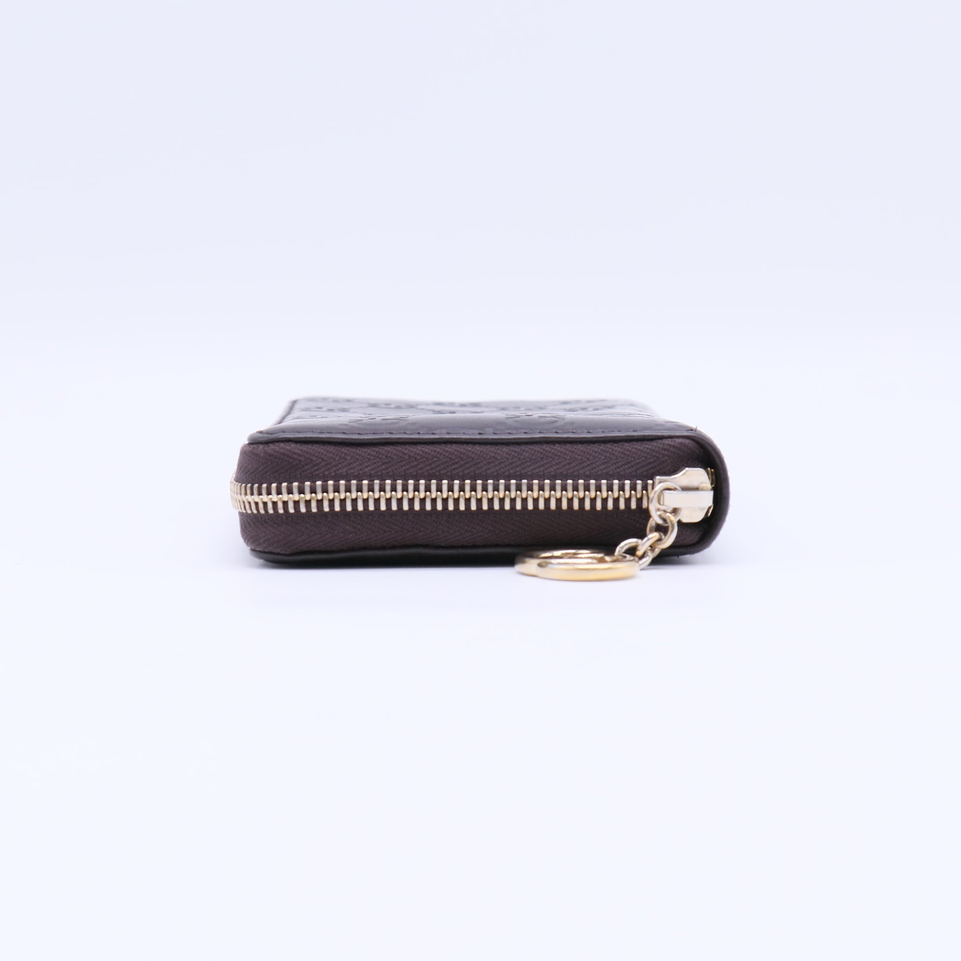 Gucci Signature Leather Zip Around Wallet W21696