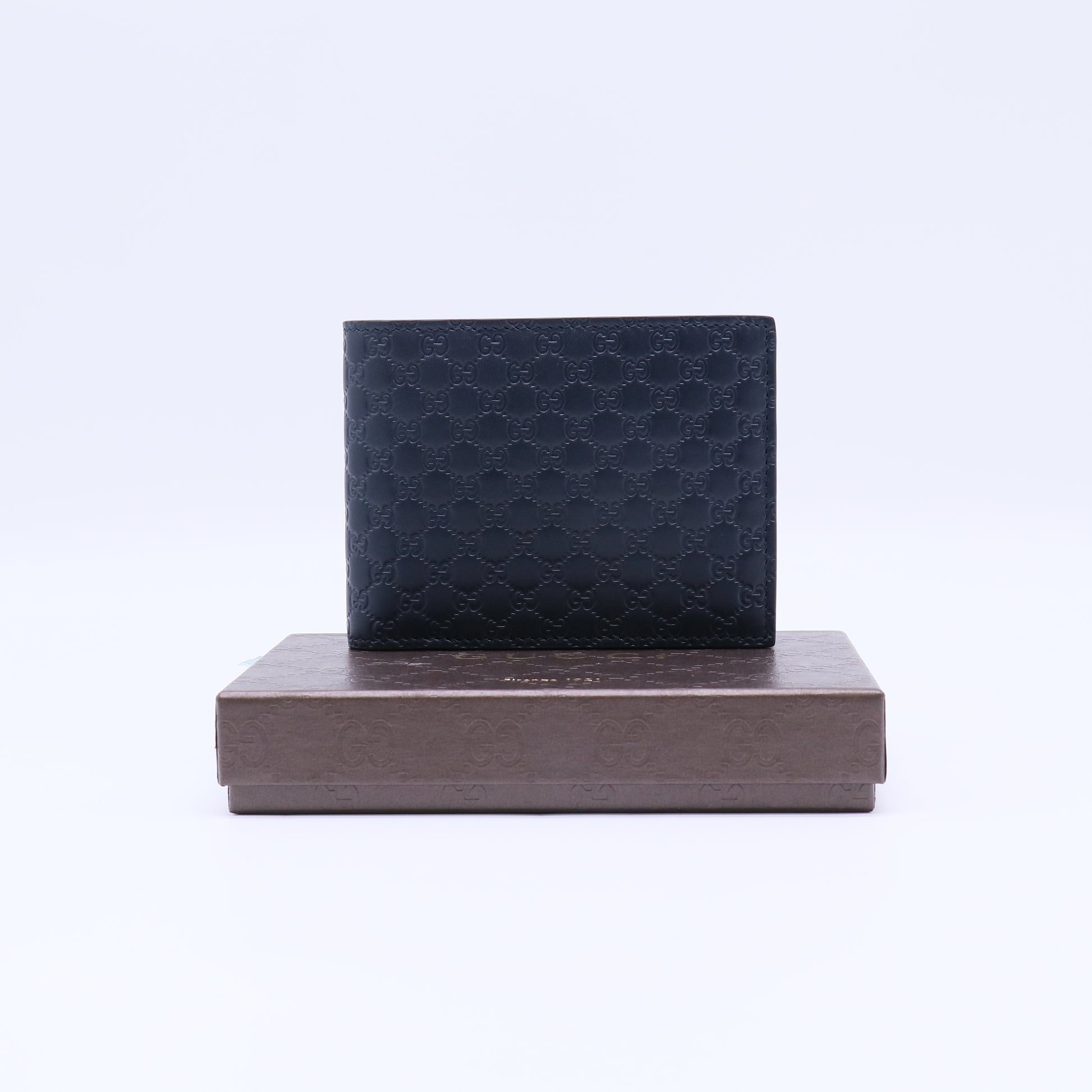 Gucci Microguccissima Leather Bi-Fold Wallet W21803