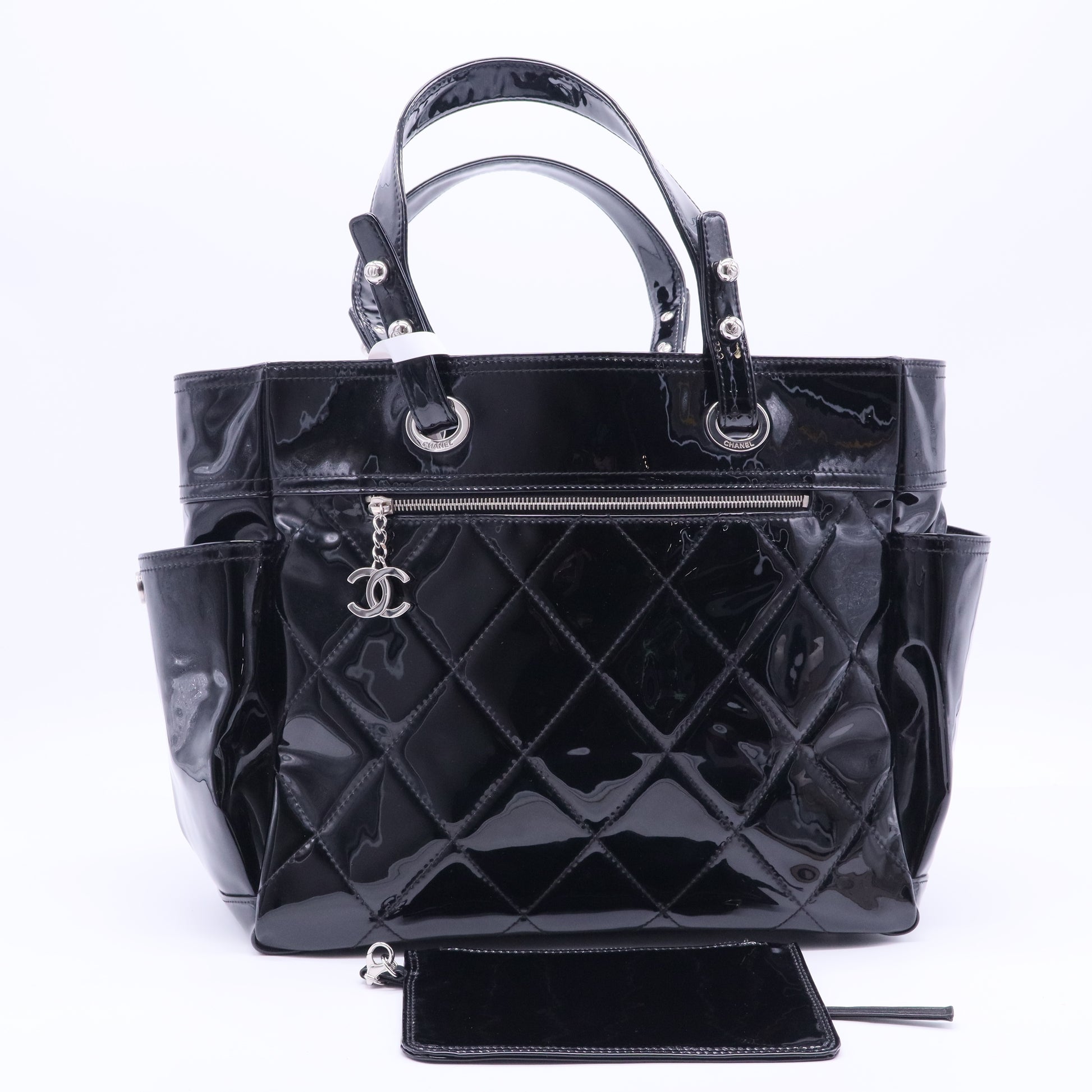 A BLACK PATENT LEATHER PARIS-BIARRITZ TOTE BAG