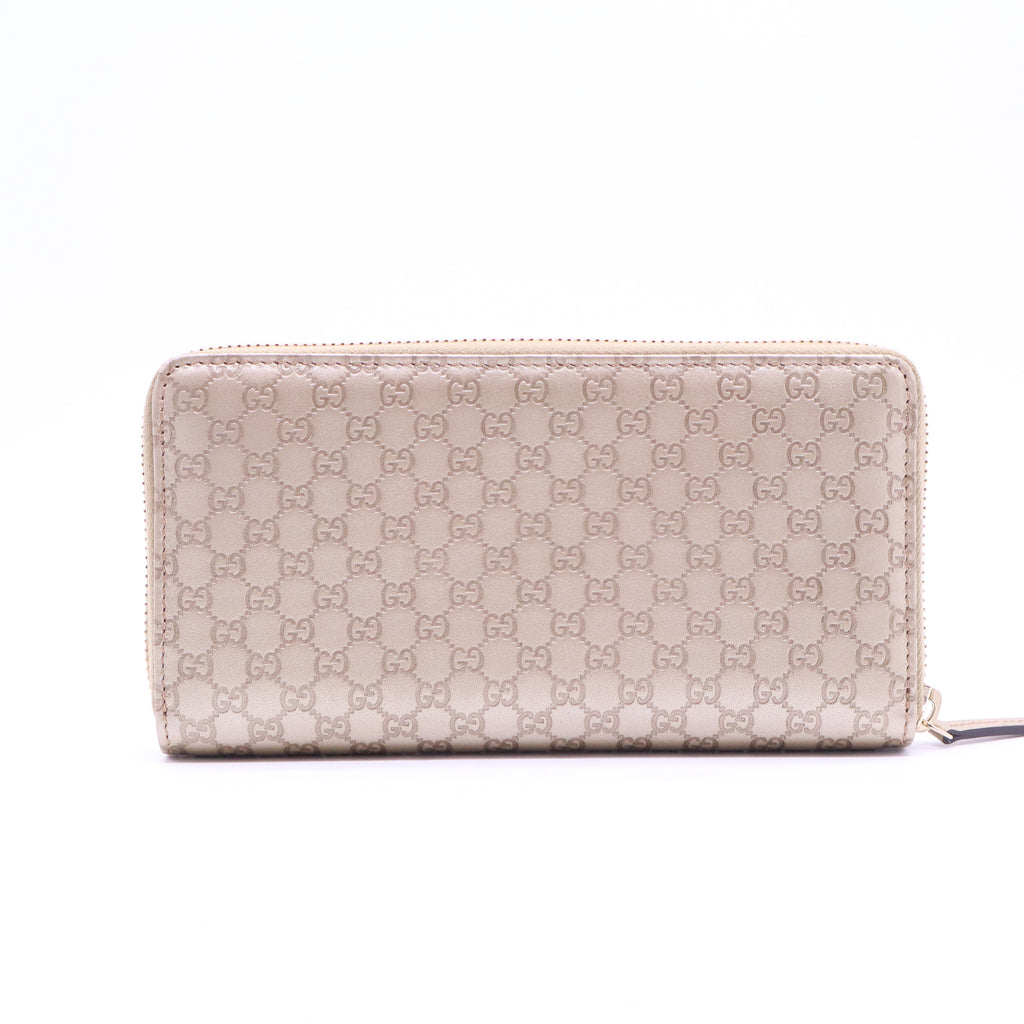 Gucci Microguccissima Bow Zip Around Wallet W21029