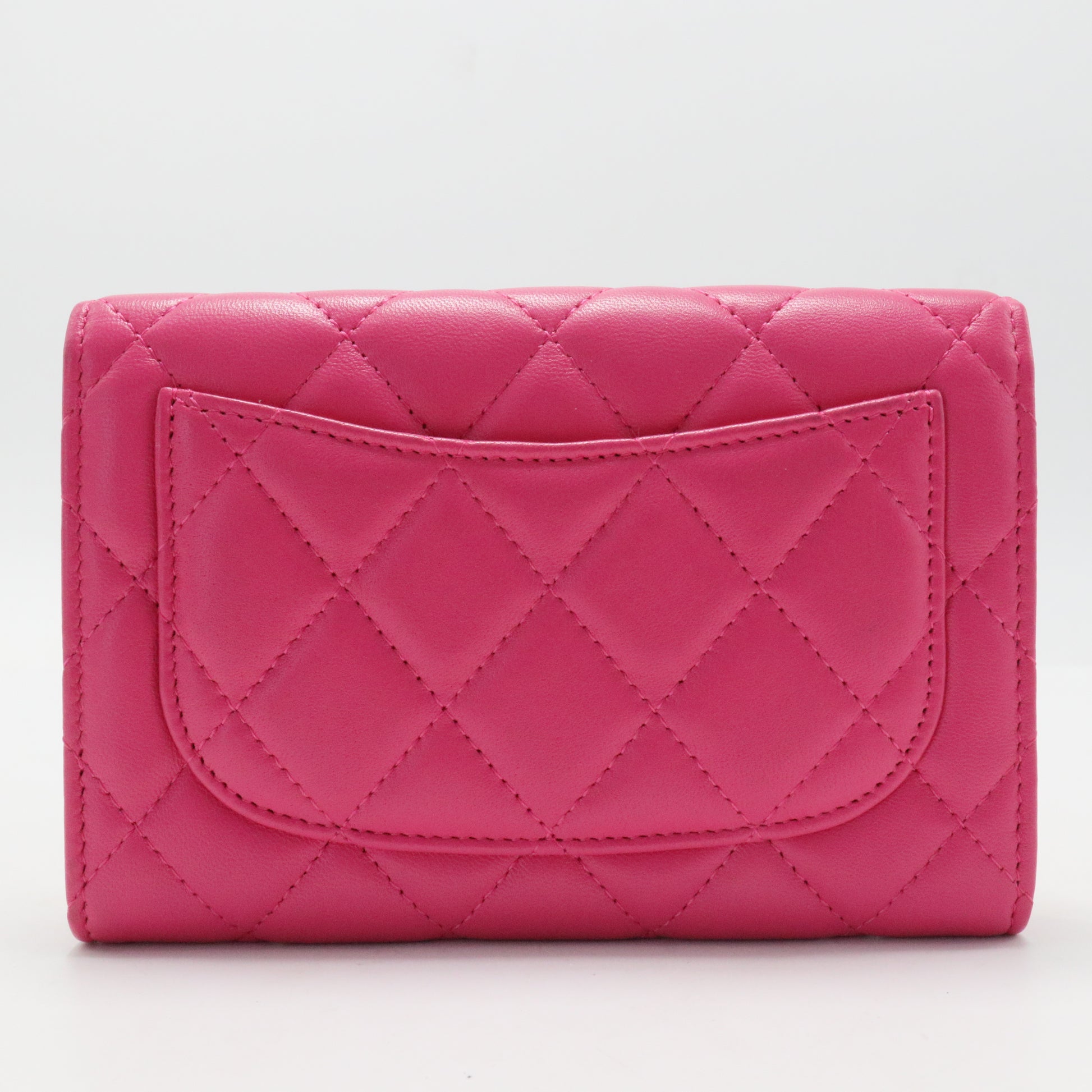 Caviar Quilted Medium Flap Wallet Fuchsia