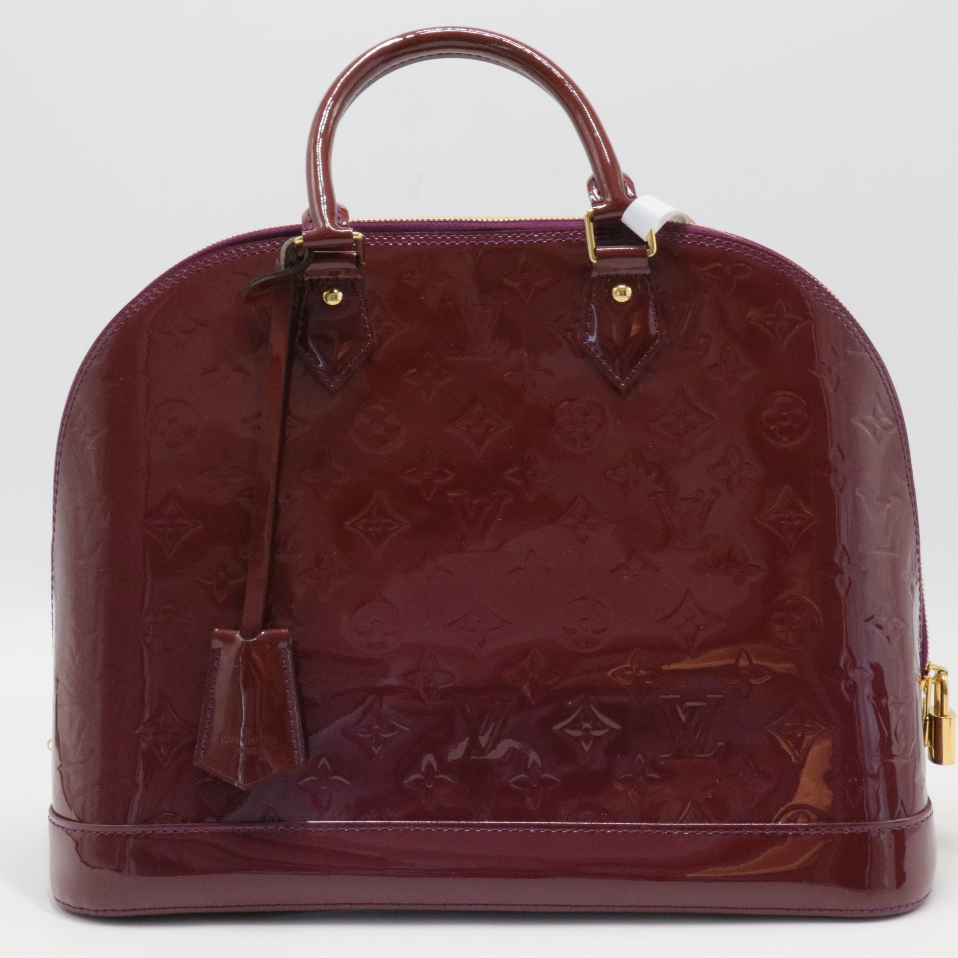 Alma Handbag Monogram Vernis MM
