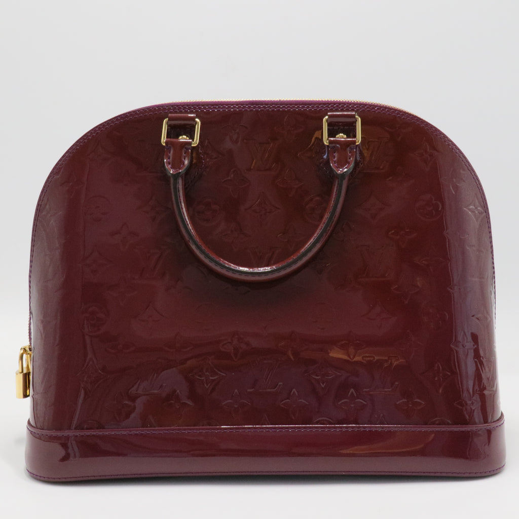 Alma Handbag Monogram Vernis MM